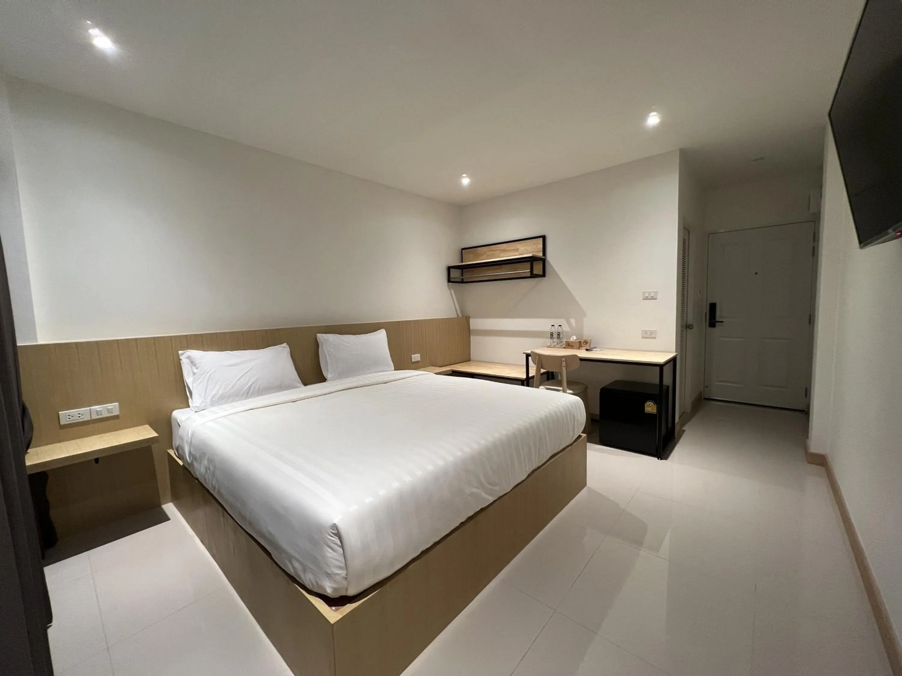 Bed in Super Highway Hotel