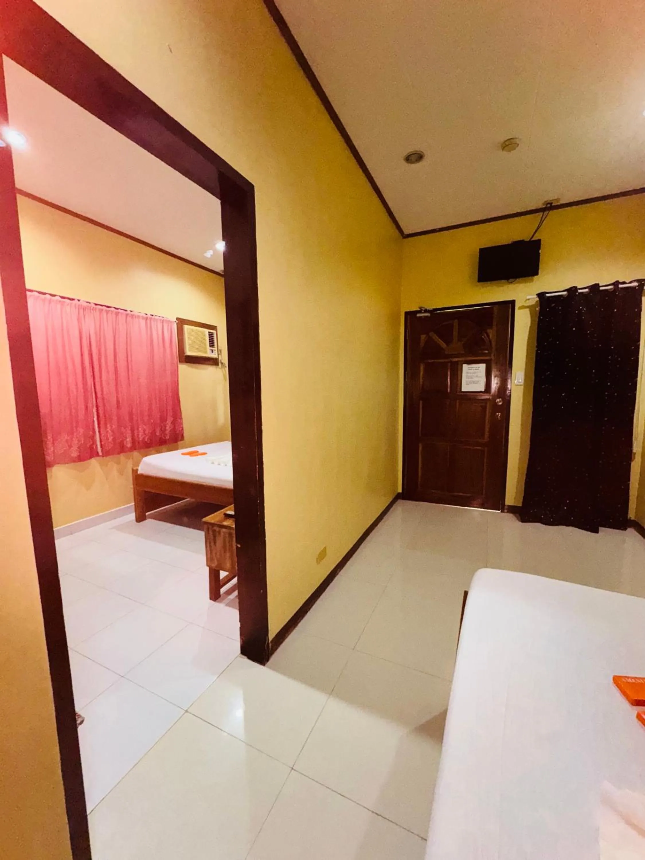 Bed in La-Familia Guest House