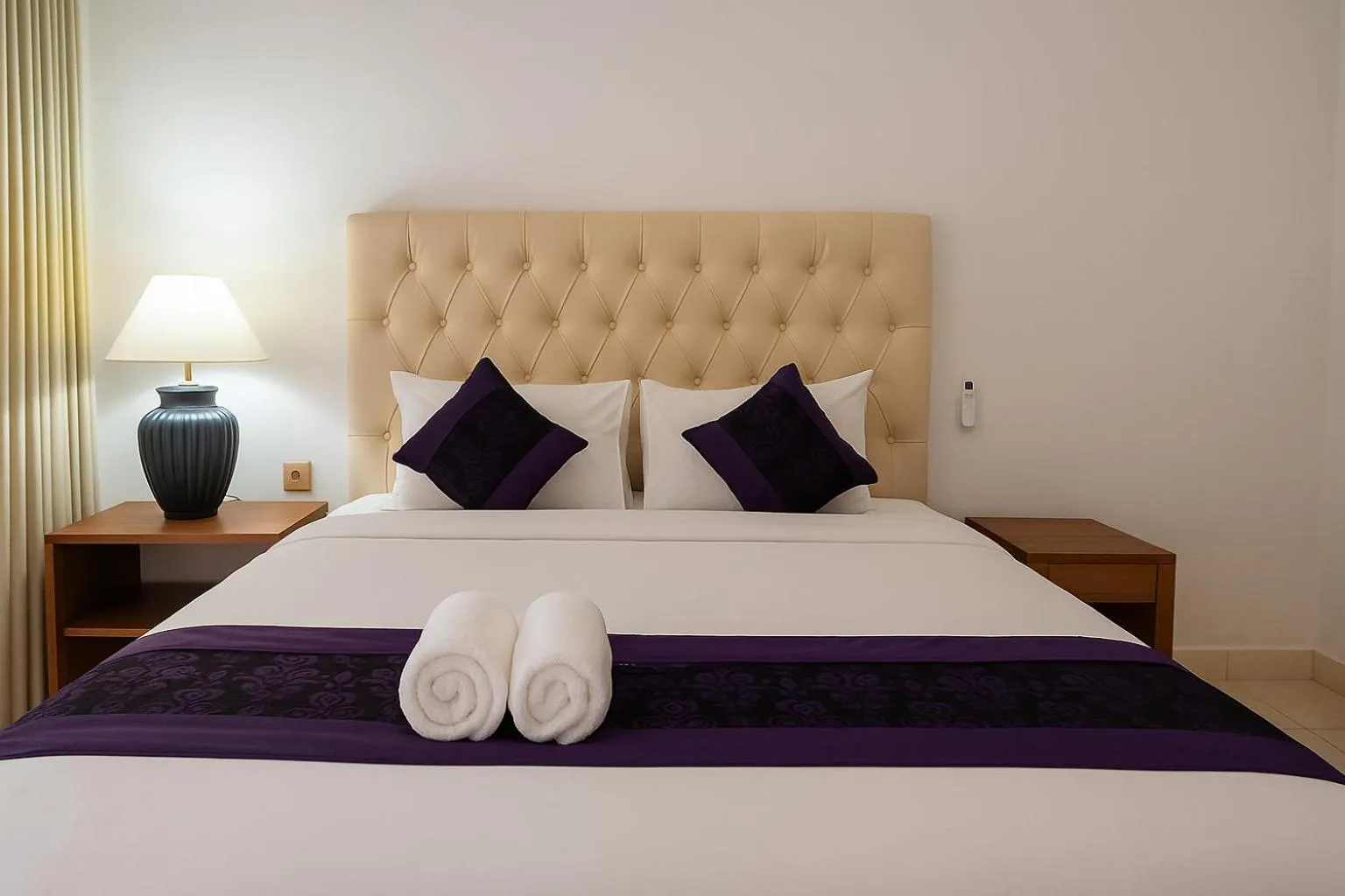 Bed in Matahari Inn Kuta Lombok