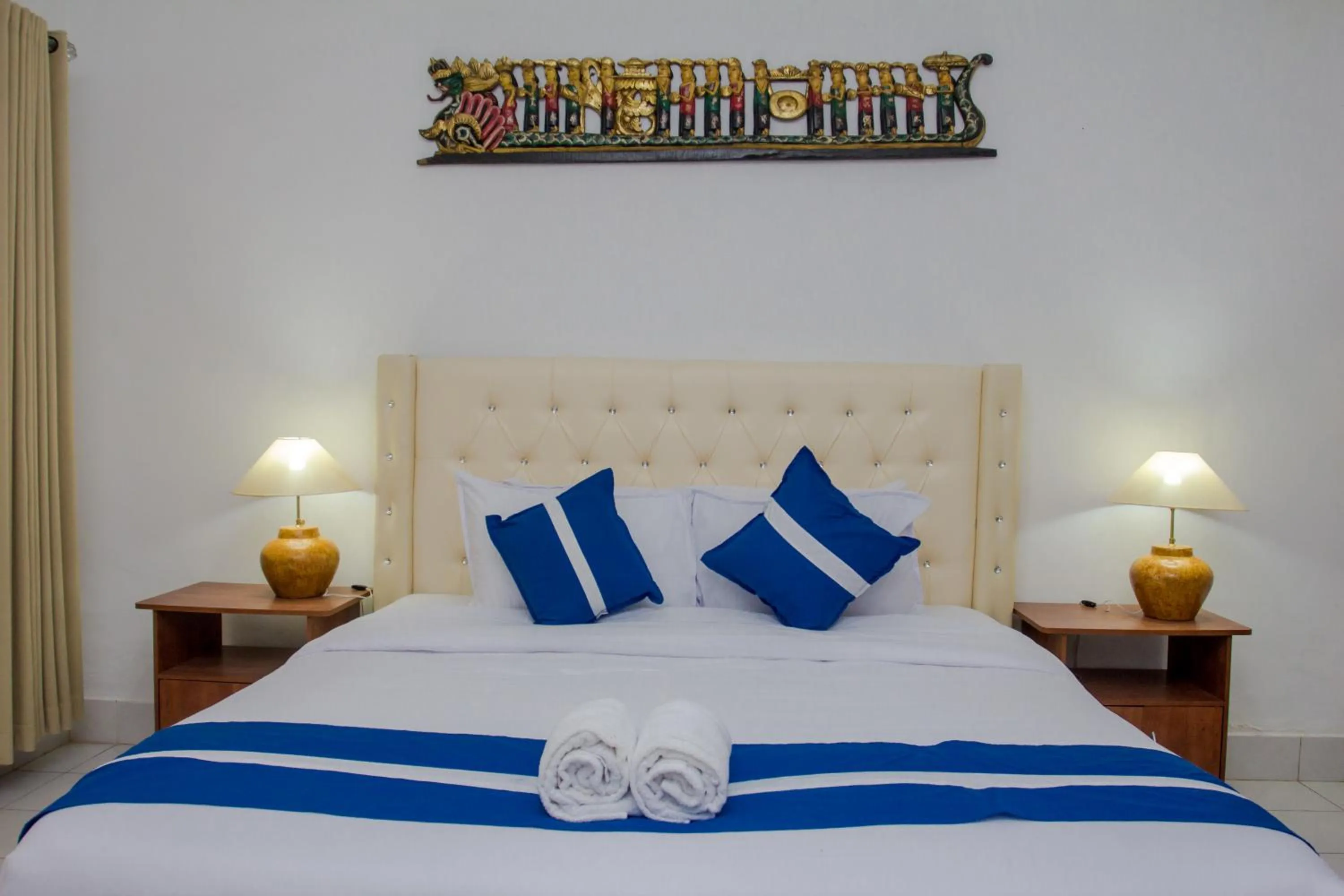 Bed in Matahari Inn Kuta Lombok