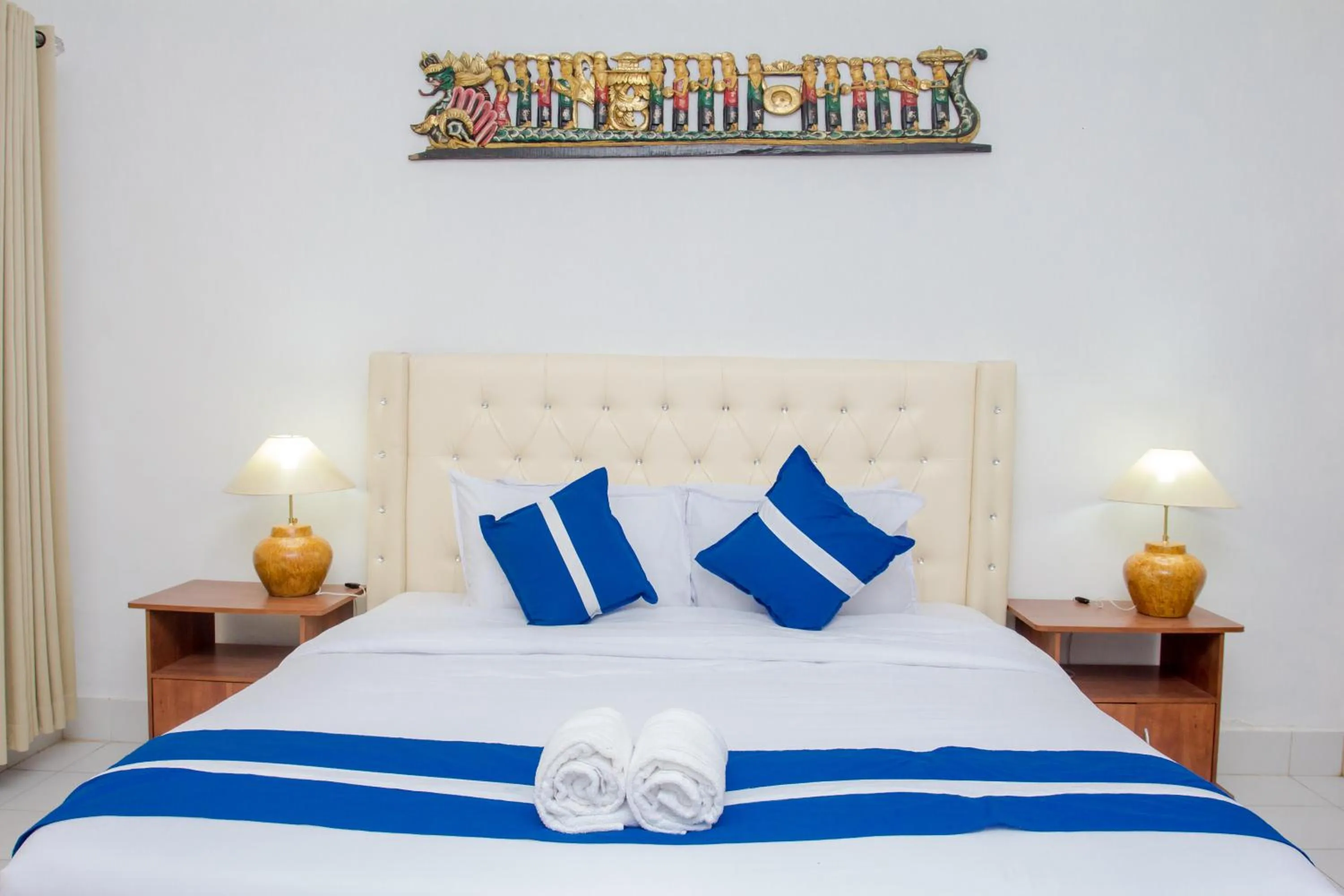 Bed in Matahari Inn Kuta Lombok