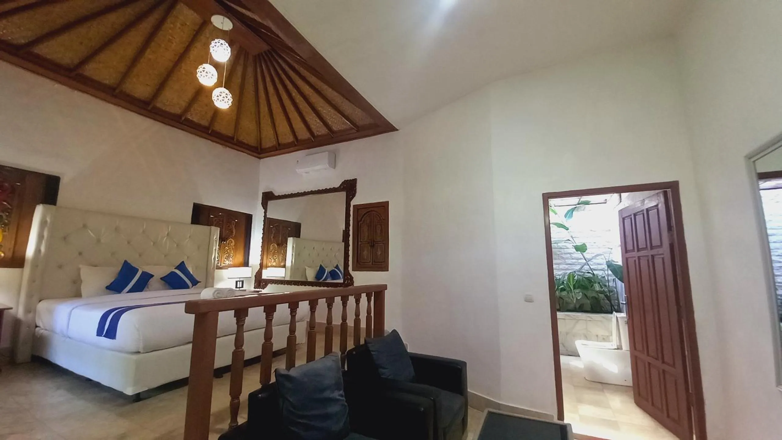 Living room, Bed in Matahari Inn Kuta Lombok