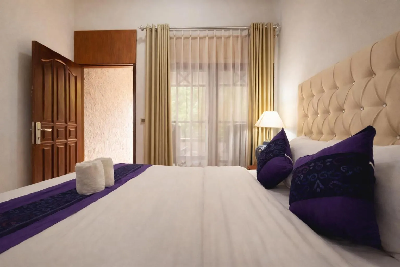 Bed in Matahari Inn Kuta Lombok