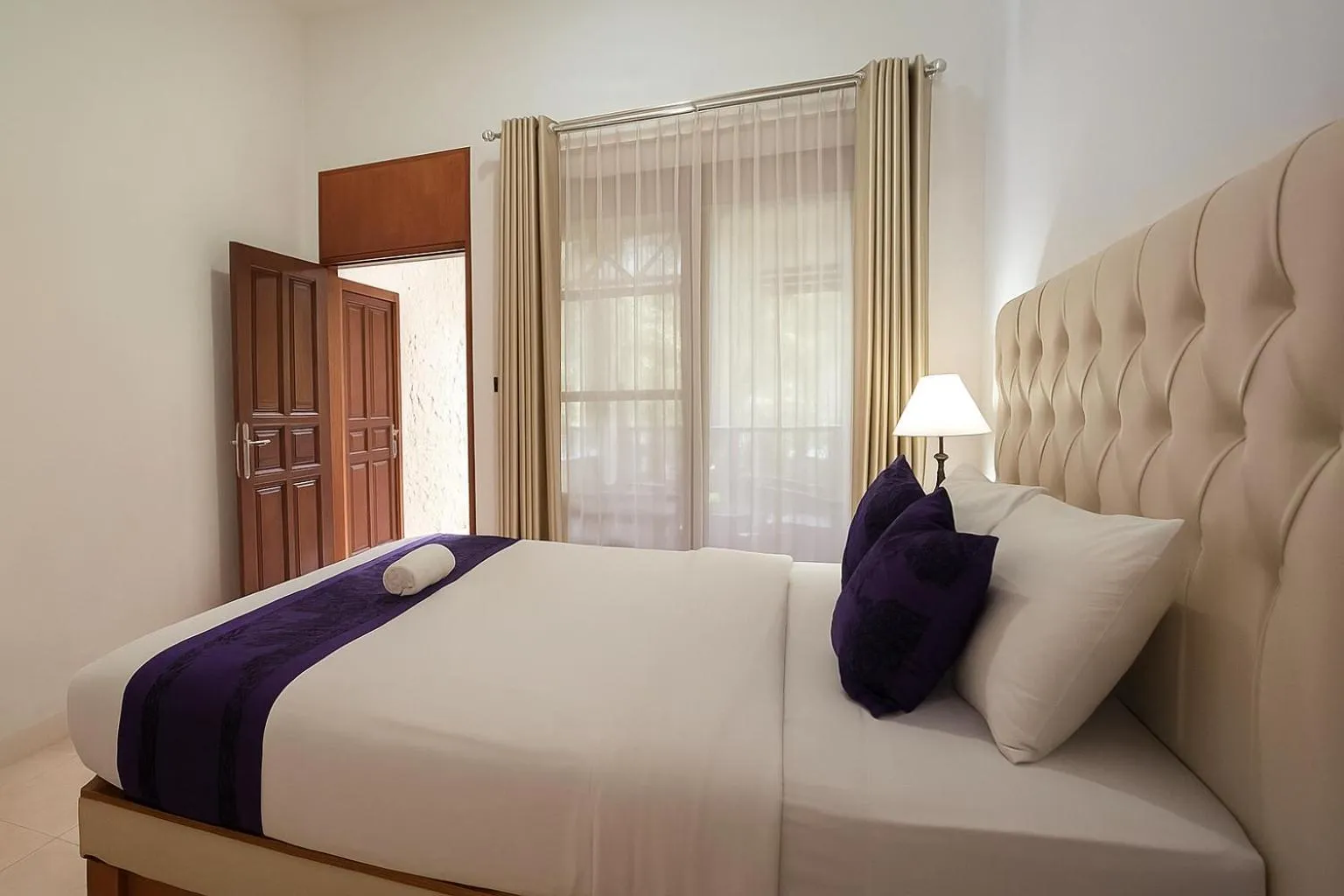 Bed in Matahari Inn Kuta Lombok