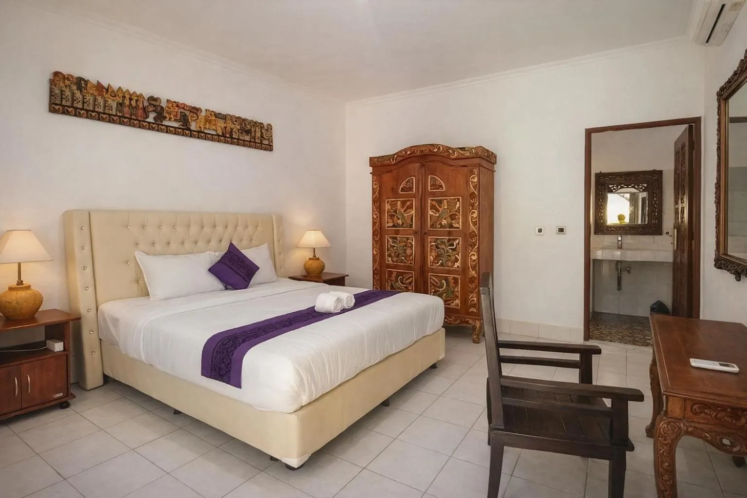 Bed in Matahari Inn Kuta Lombok