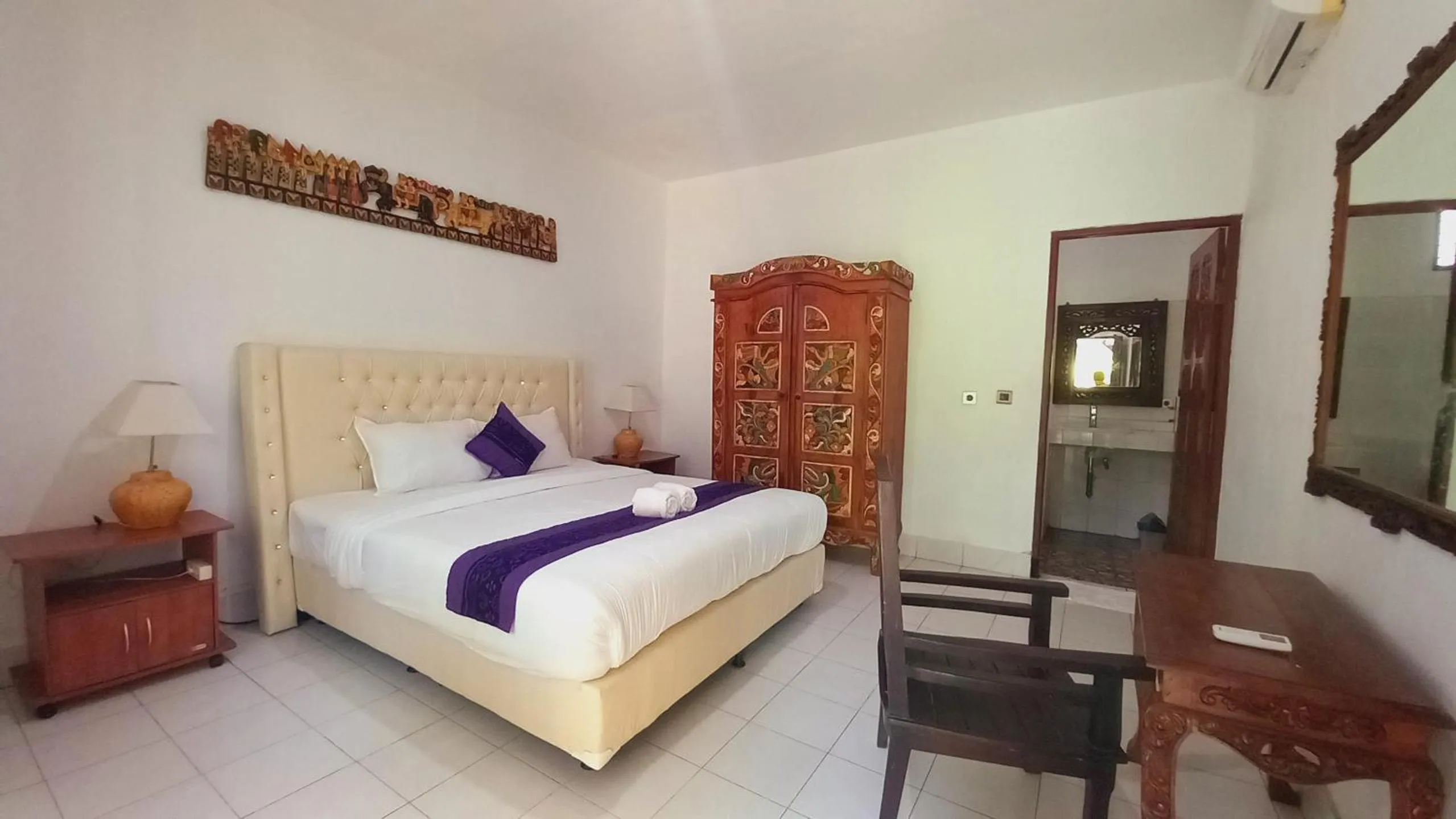 Bed in Matahari Inn Kuta Lombok