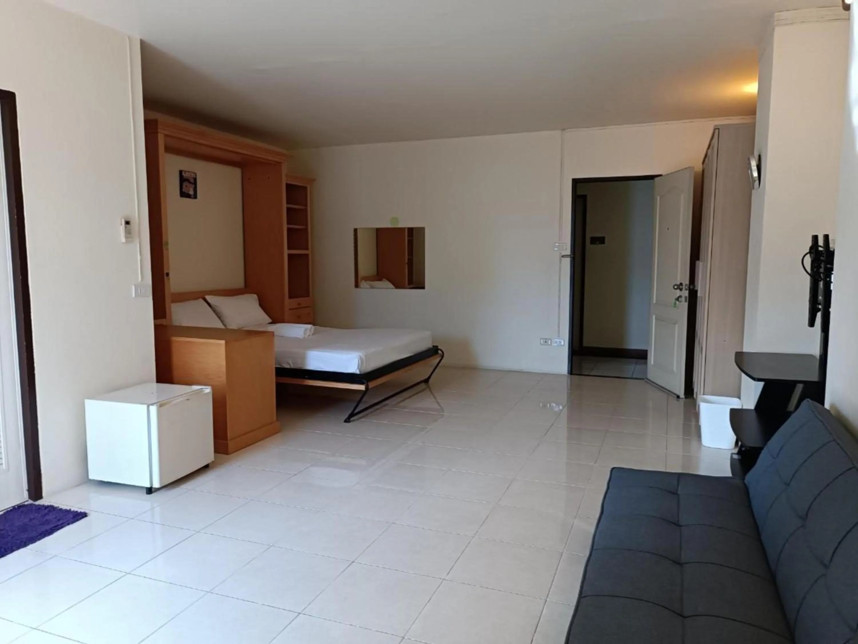 Bedroom, Bed in Grandview Condominia