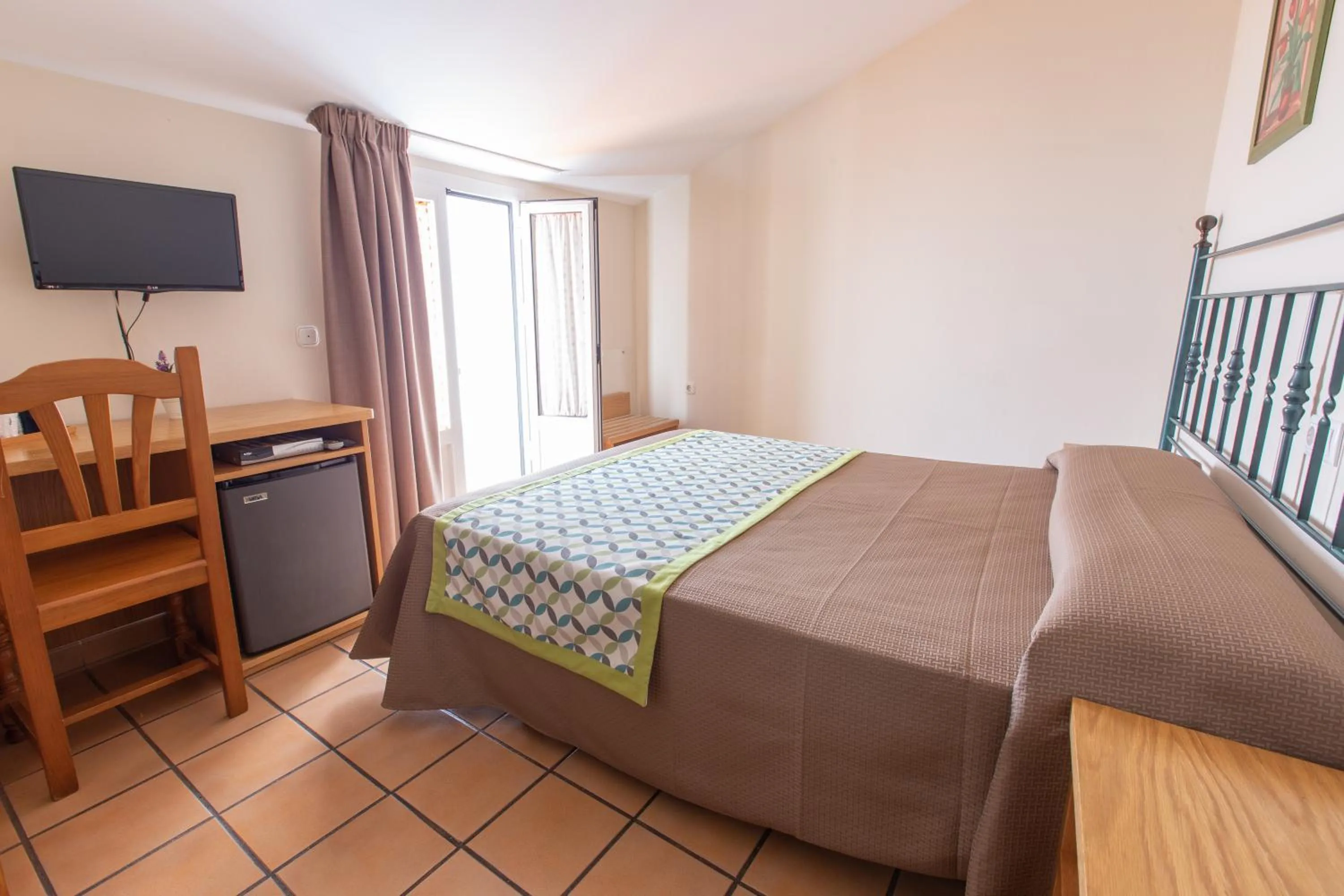 Bed in Hostal El Gallo