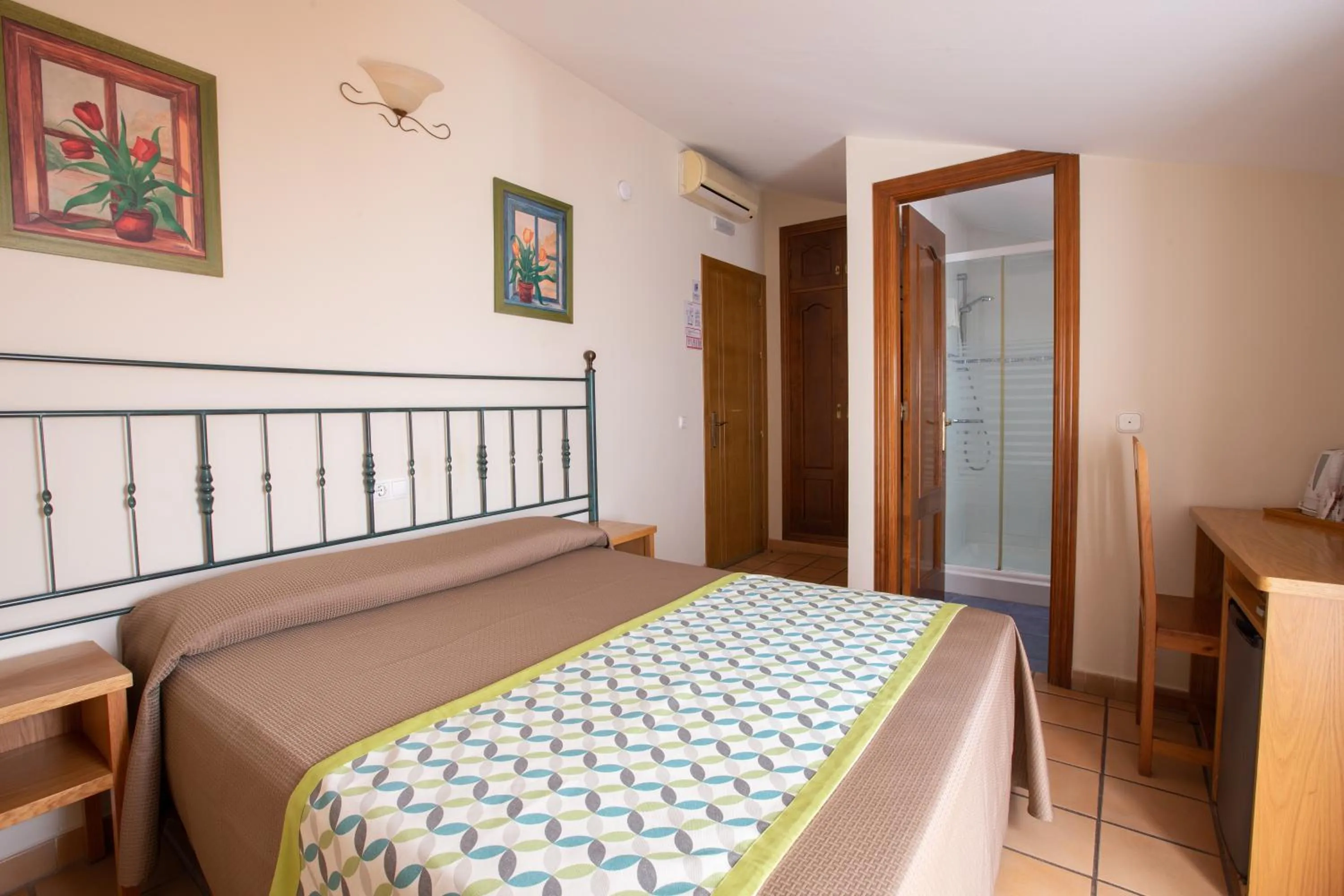 Bed in Hostal El Gallo