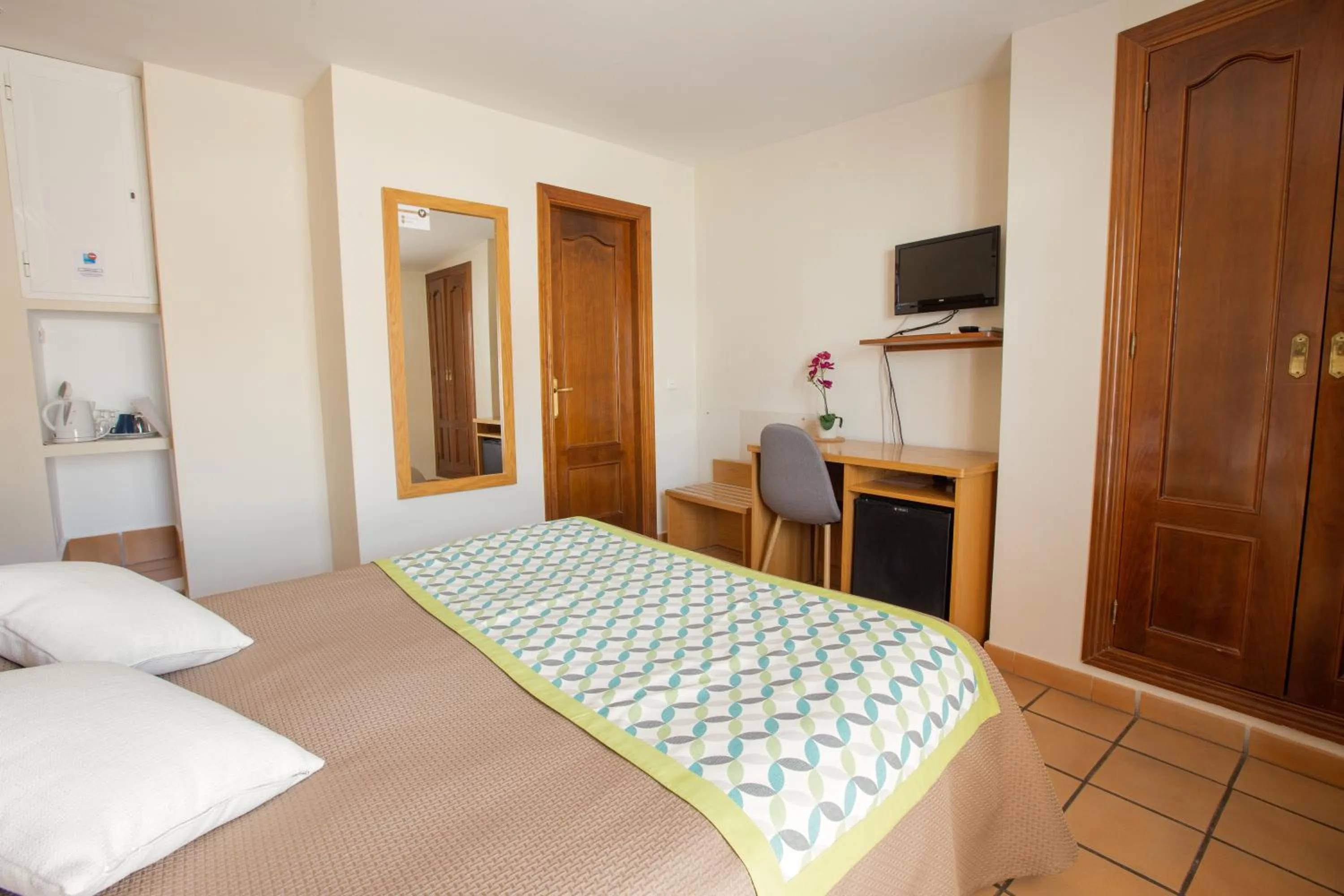 Bed in Hostal El Gallo