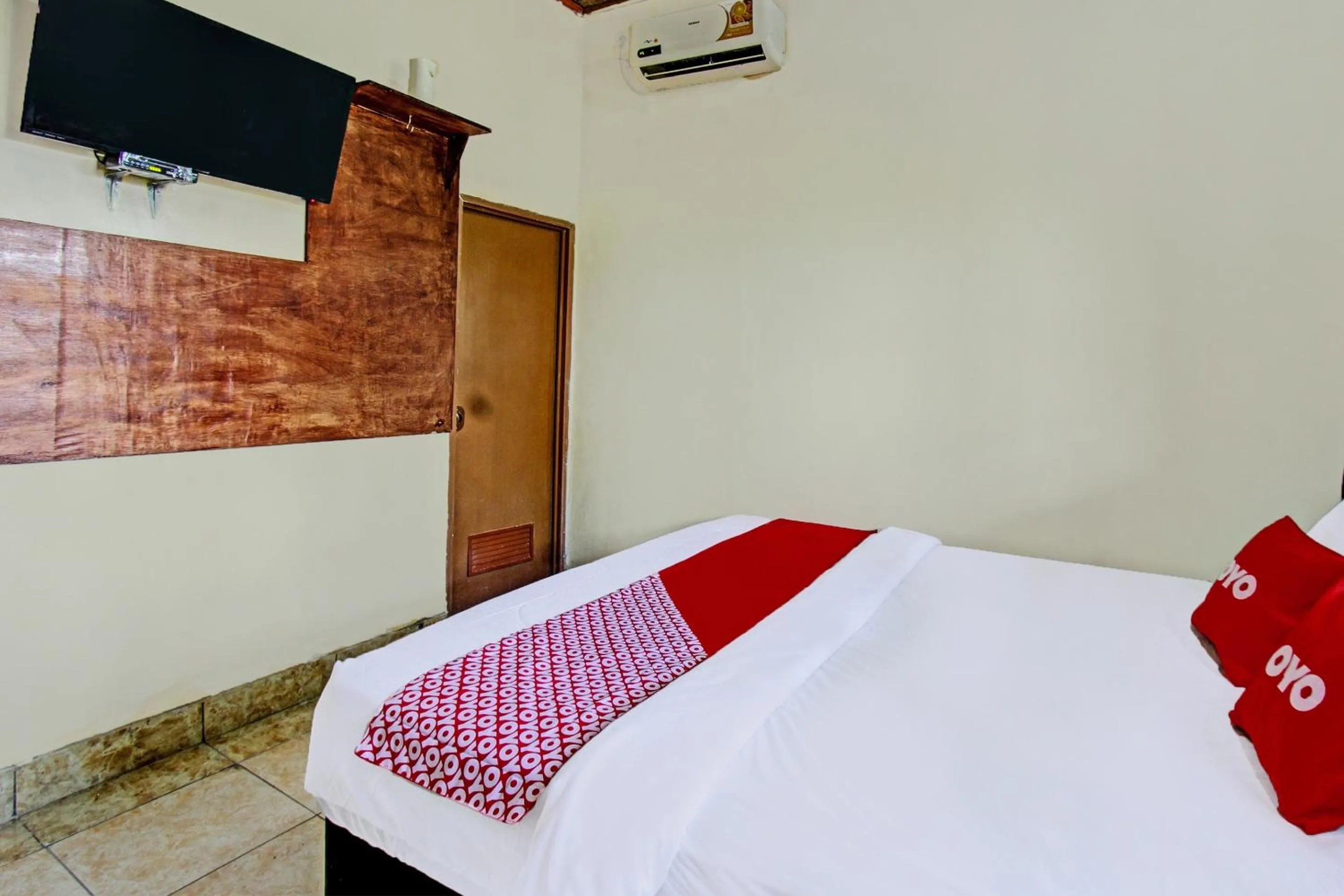 Bedroom, Bed in Hotel O Archi Homestay