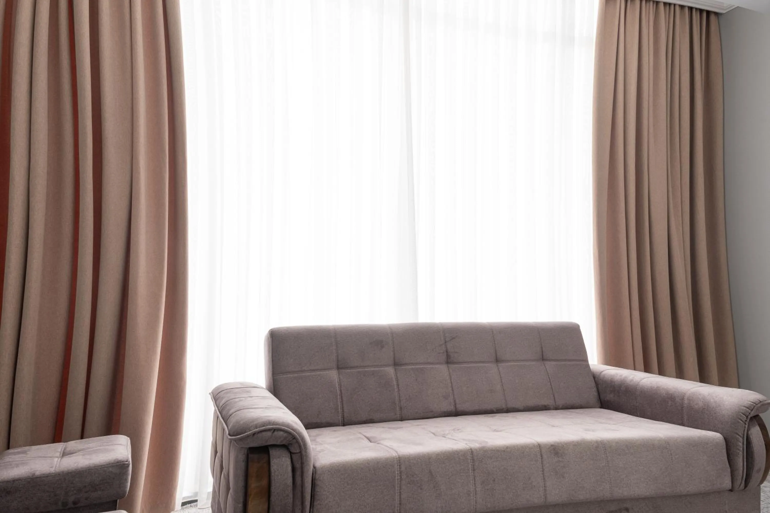 Living room in Mir Luxe Plaza