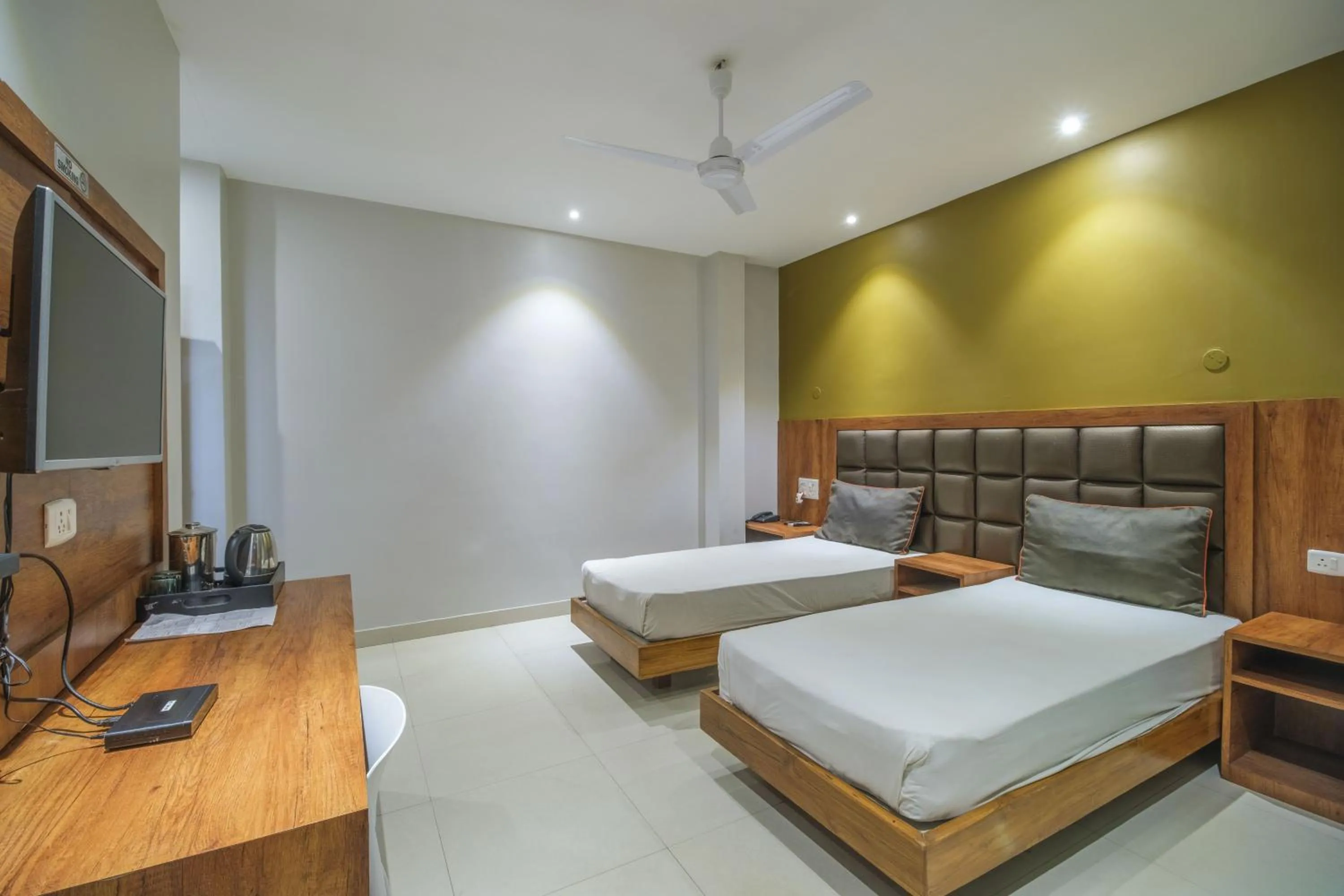 Bed in Hotel Parnil Residency