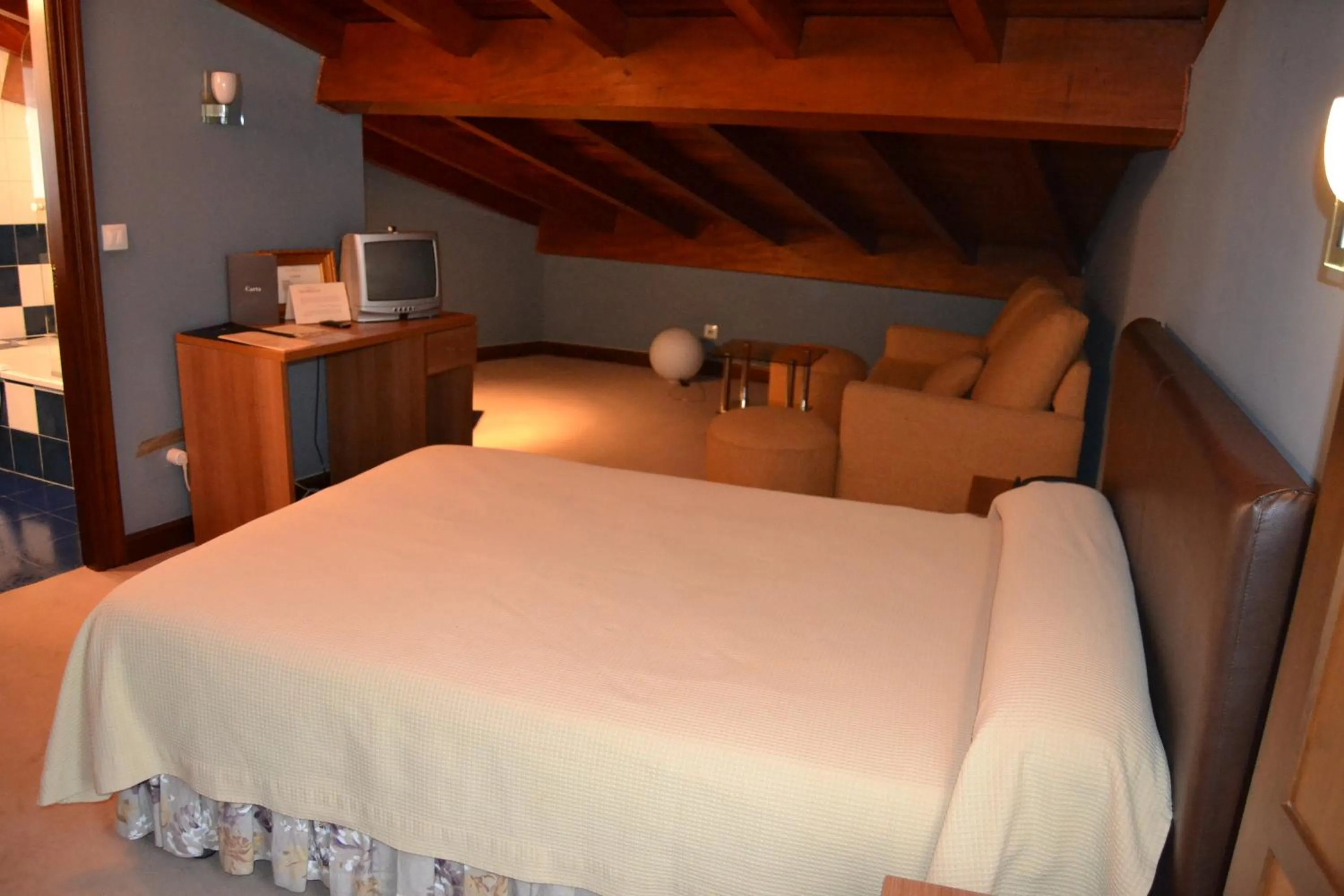 Photo of the whole room, Bed in Gran Hotel Rural Cela