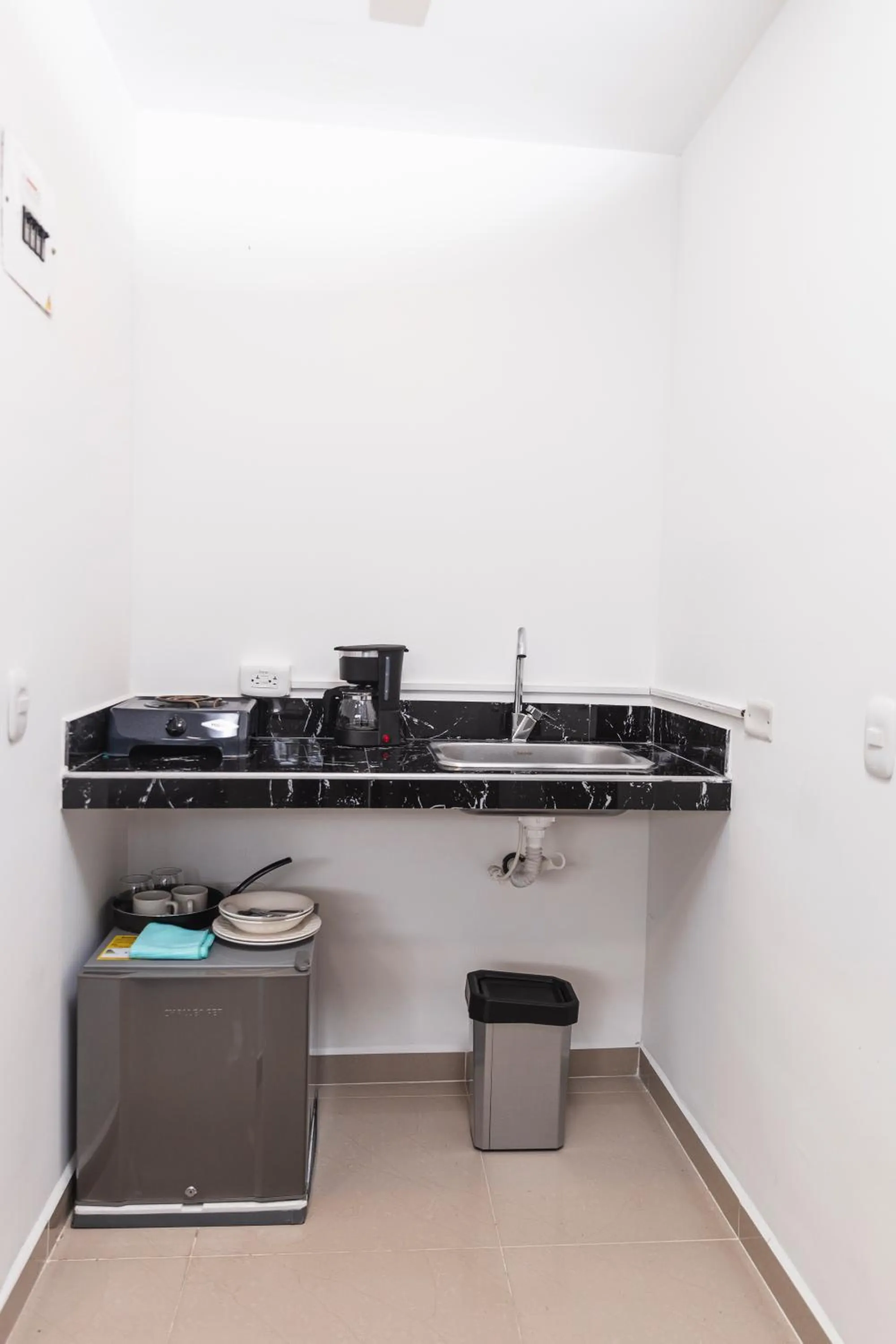 Kitchen or kitchenette in Hotel Boutique Business Center