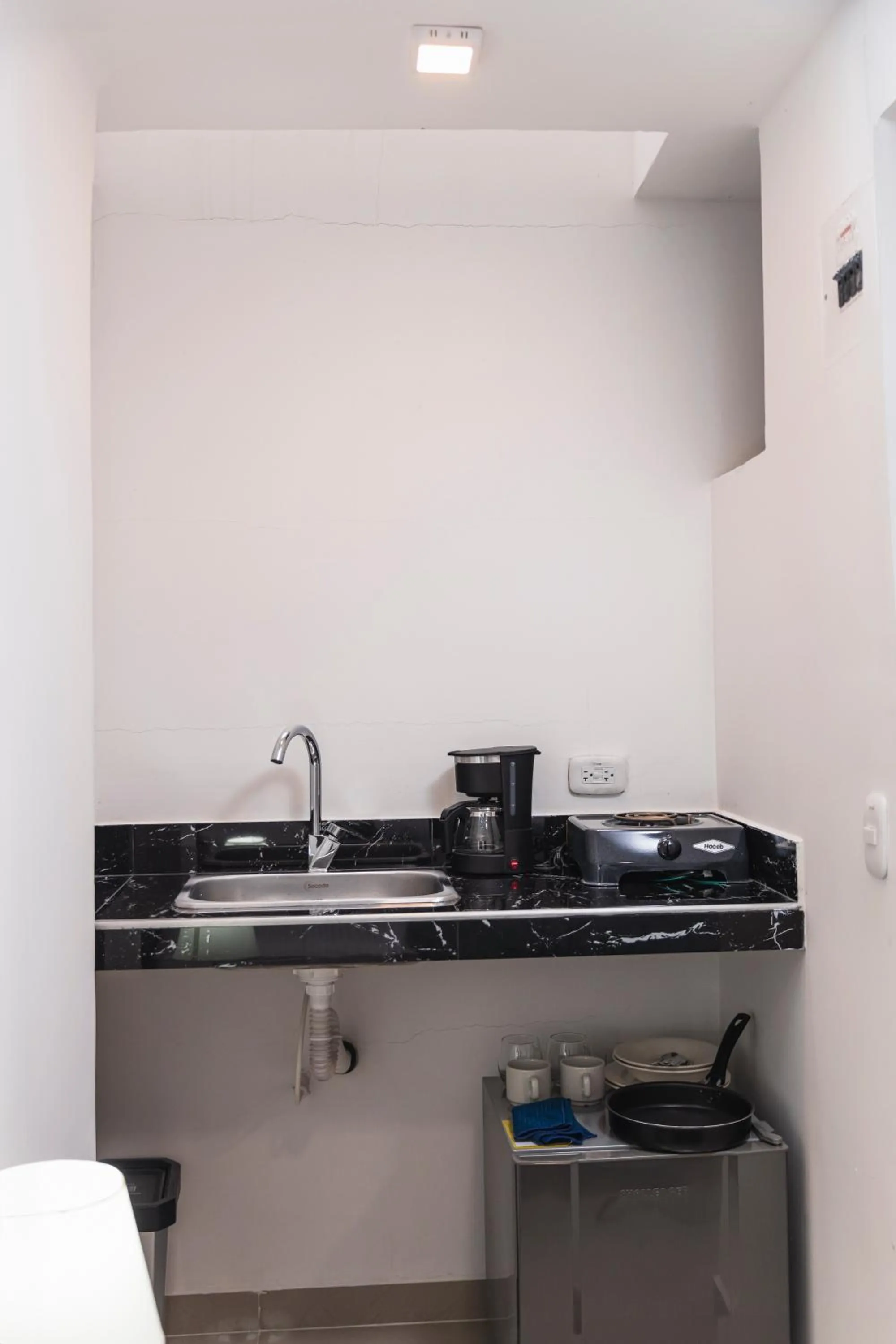 Kitchen or kitchenette in Hotel Boutique Business Center