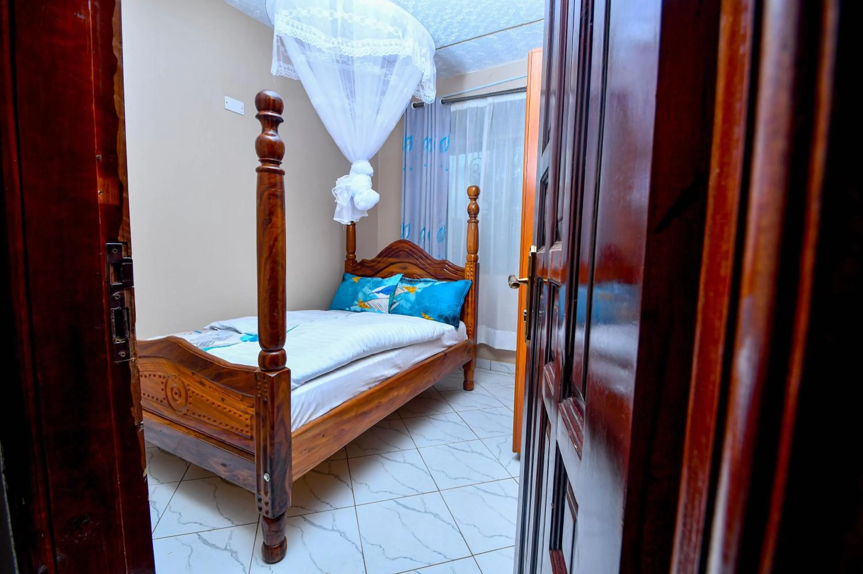 Bed in Peace of Mind Suites