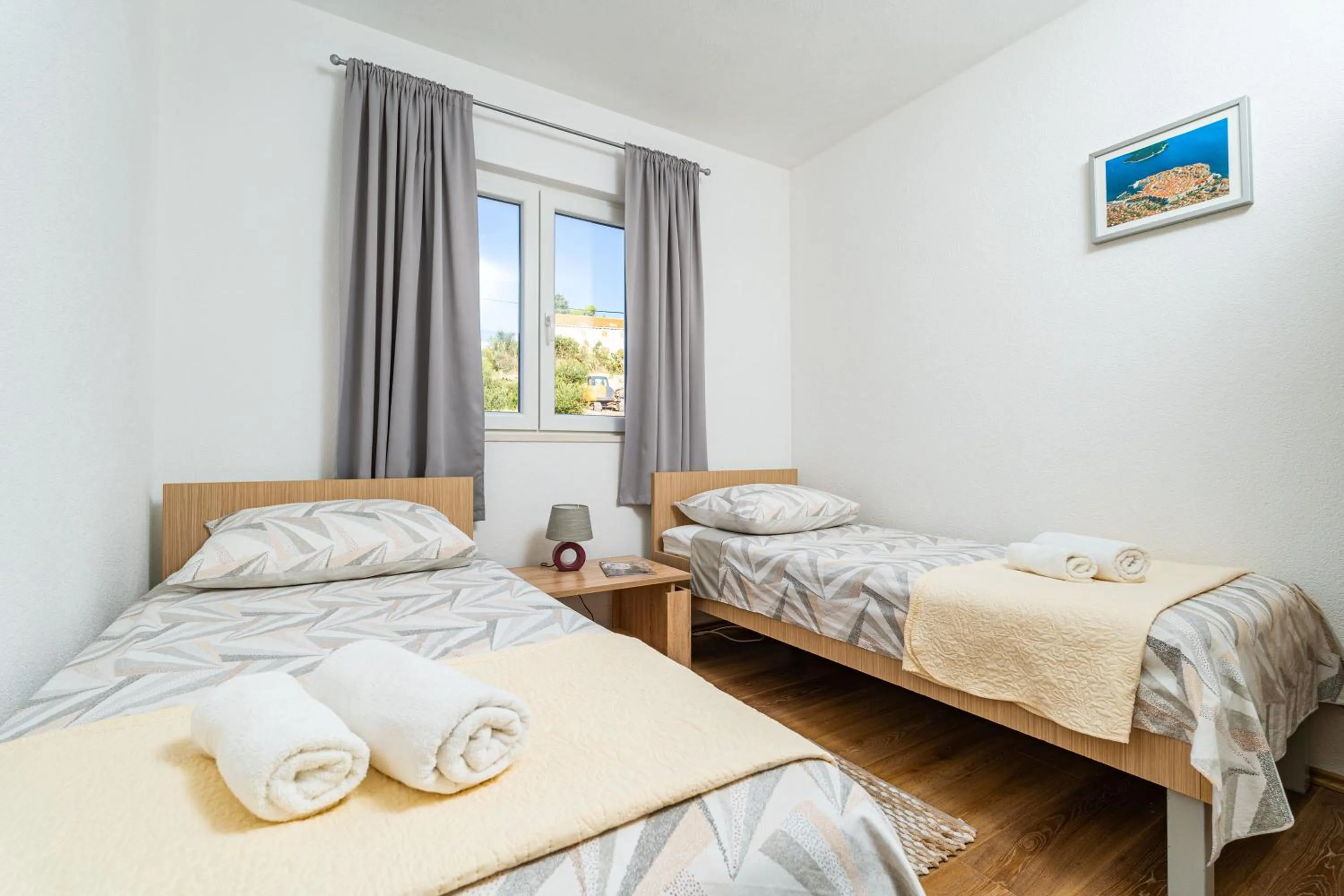 Bed in Sea View Apartment Nuncijata