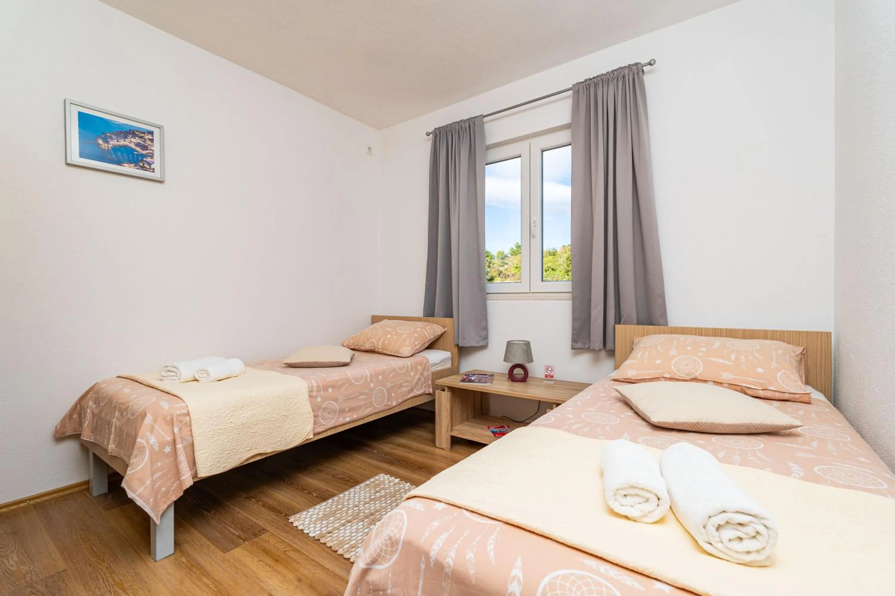Bed in Sea View Apartment Nuncijata