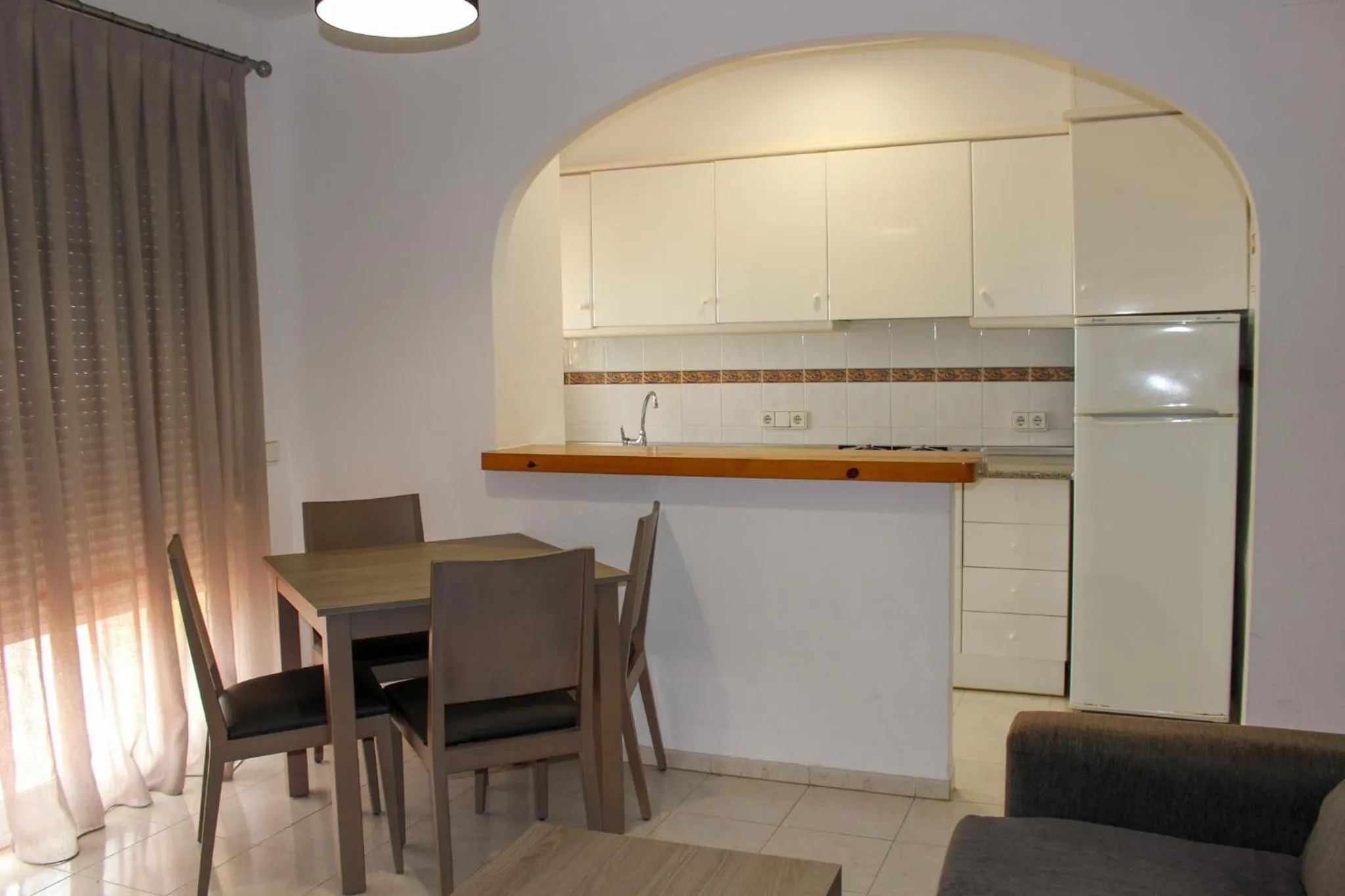 Living room in Bungalows Imperial Park Unitursa