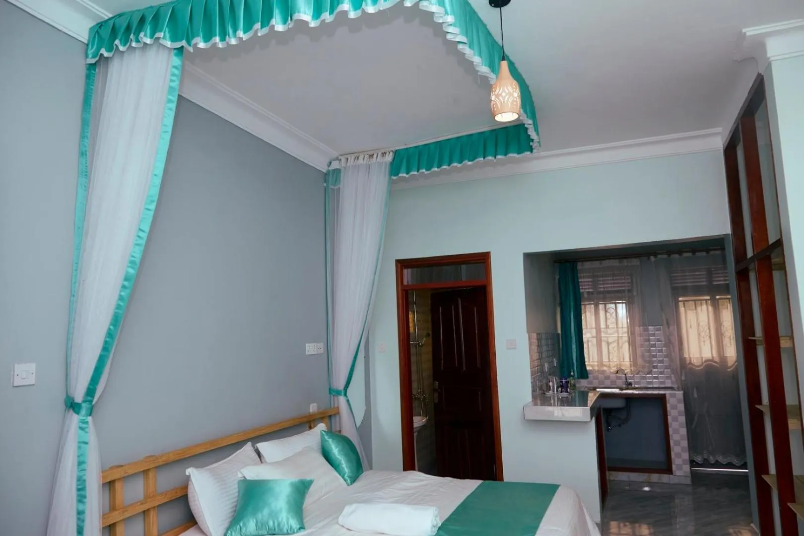 Bed in WestWay Luxury Suites