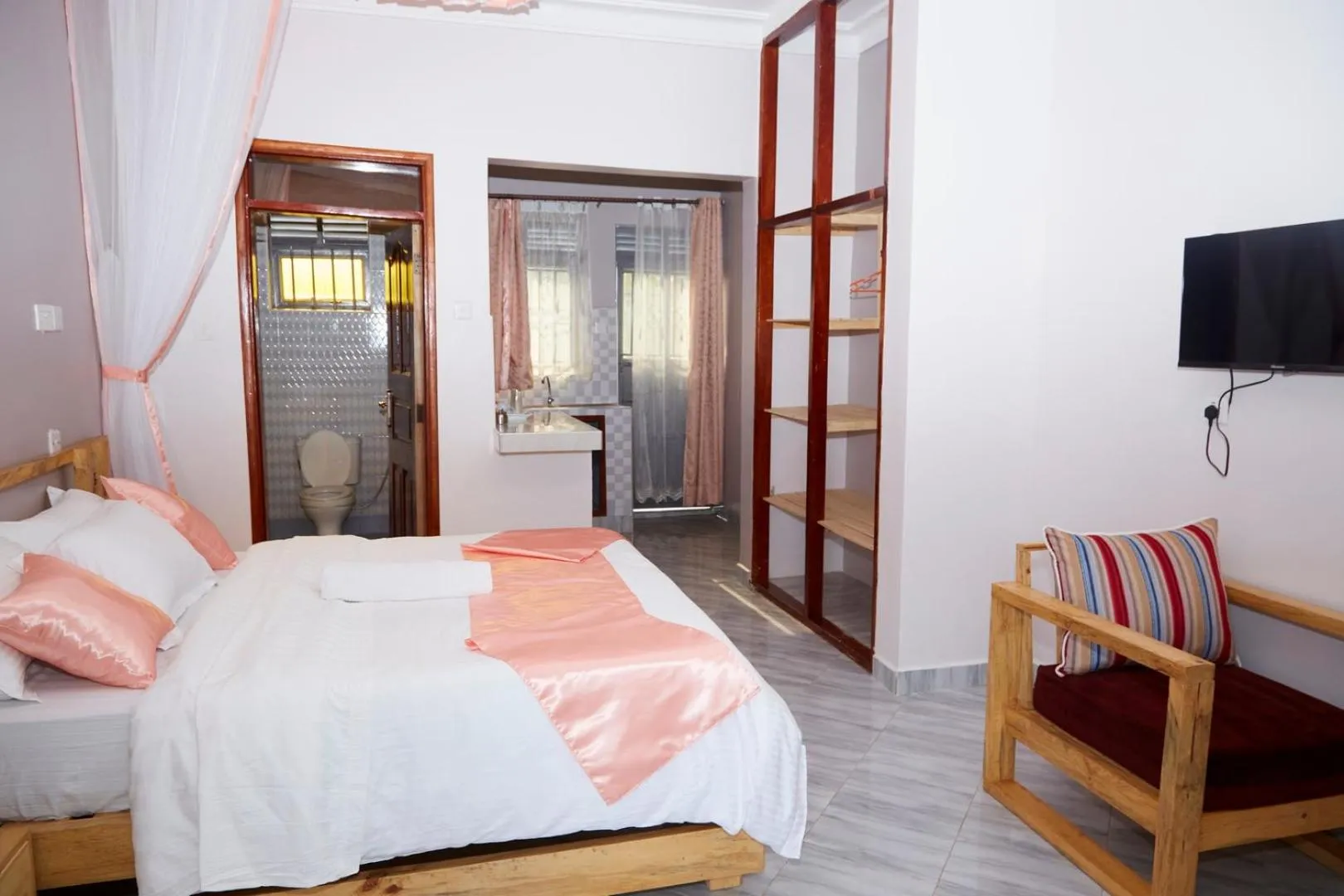 Bed in WestWay Luxury Suites