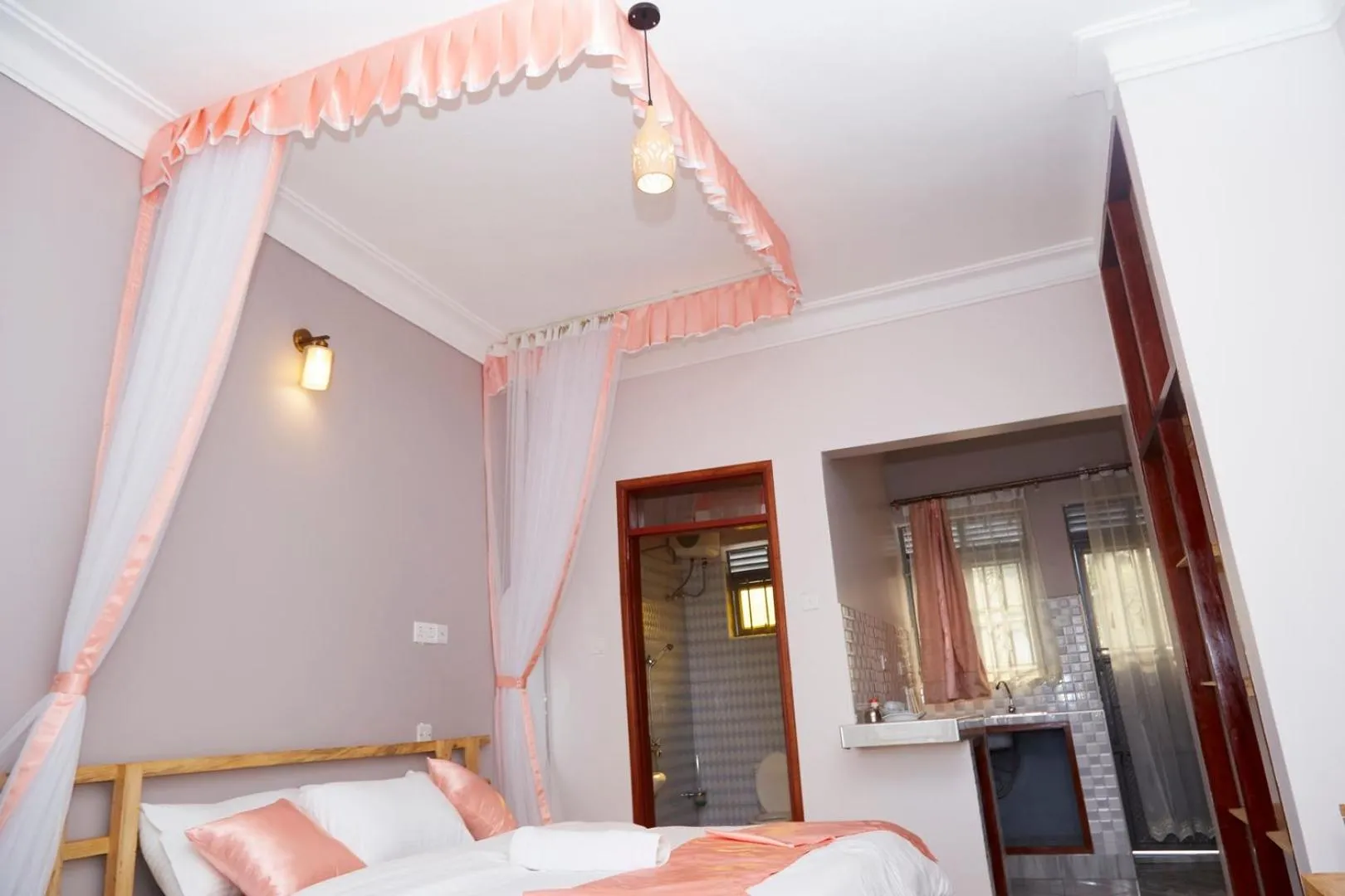 Bed in WestWay Luxury Suites