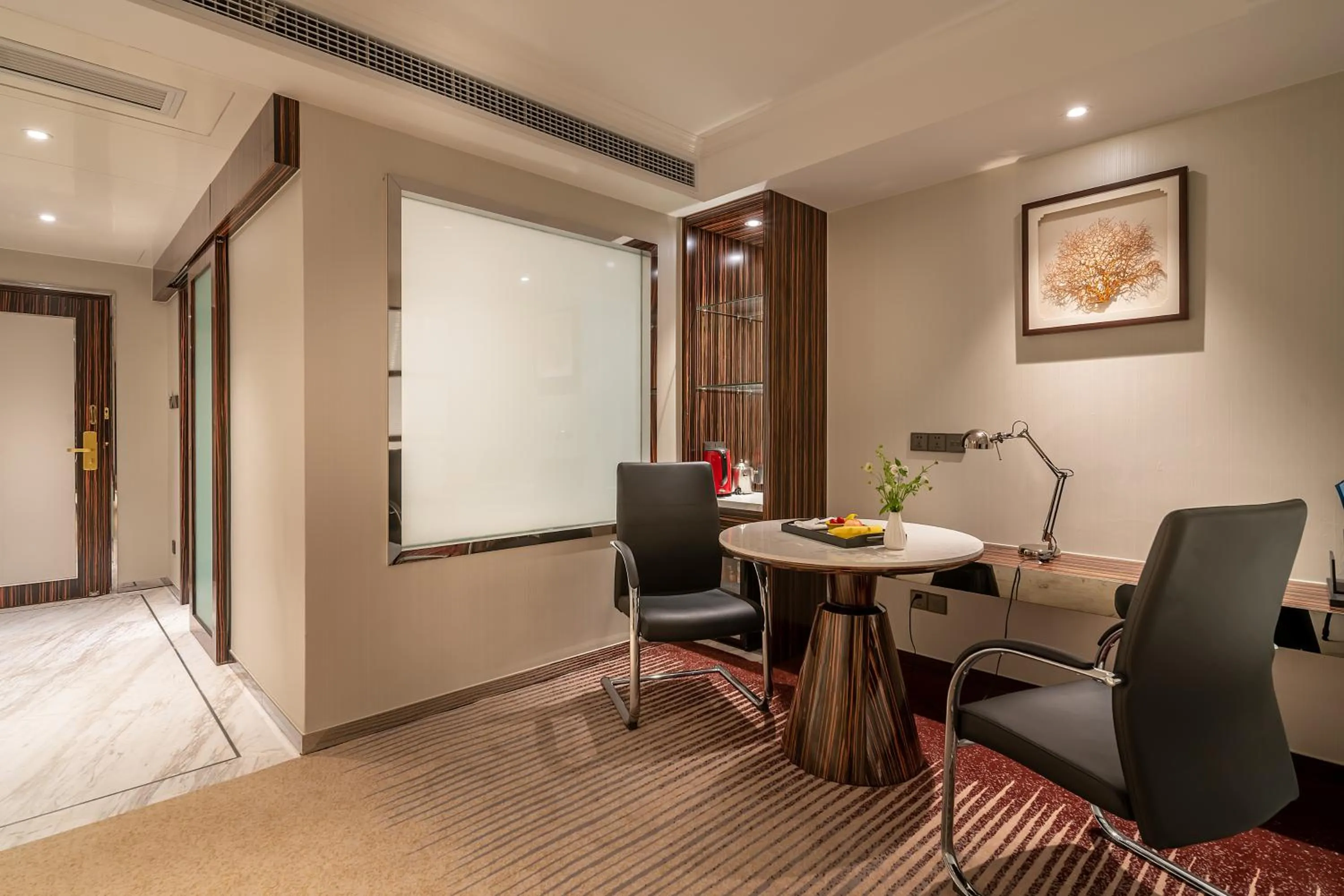 Living room in Suning Universal Hotel ALL-SUITES