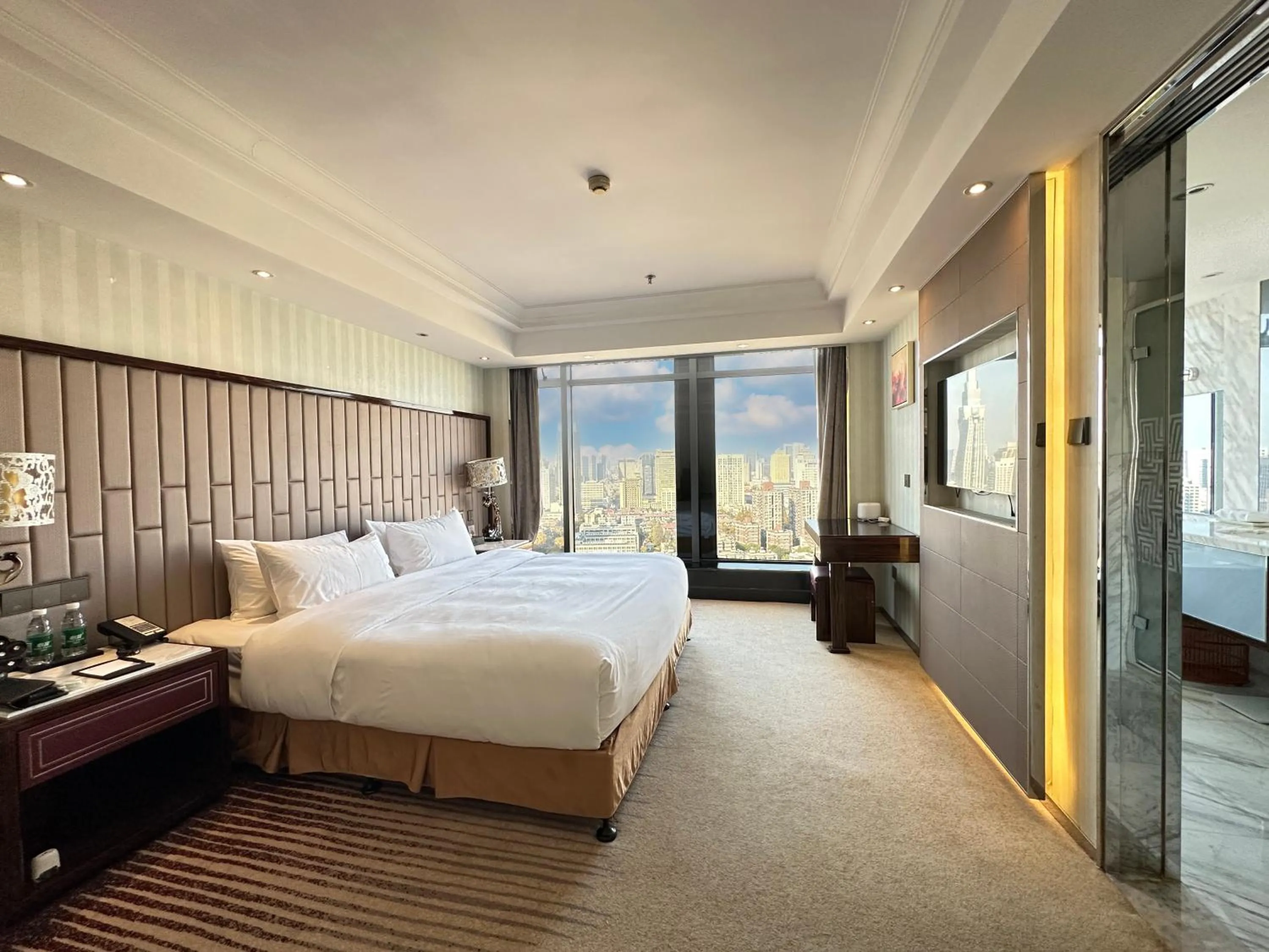 City view, Bed in Suning Universal Hotel ALL-SUITES