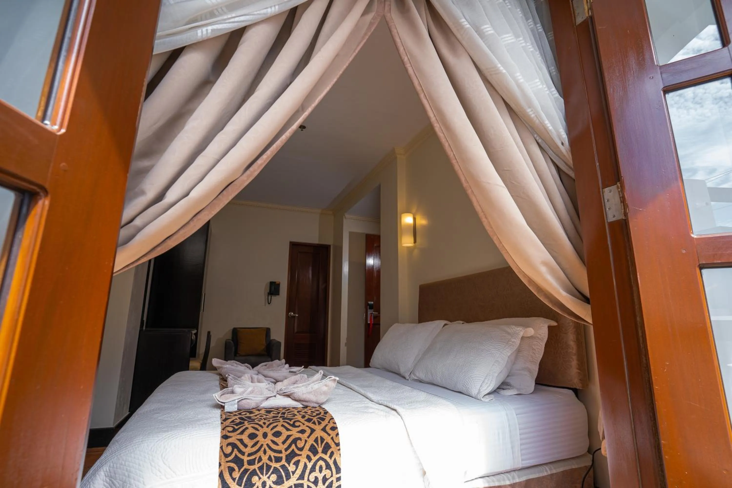 Photo of the whole room, Bed in West Loch Park Hotel Vigan