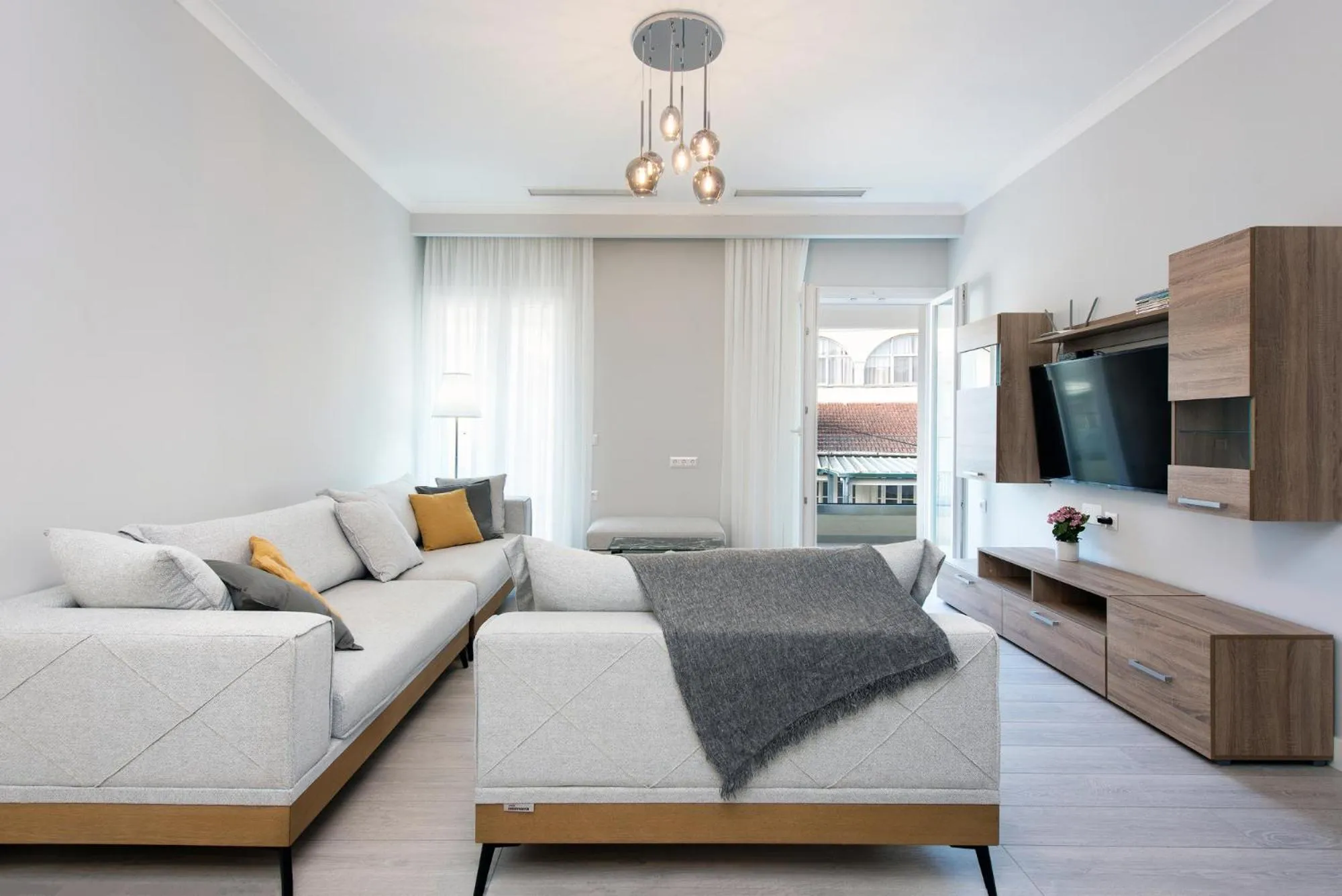 Living room in Pelagia Apartment by Kormaris