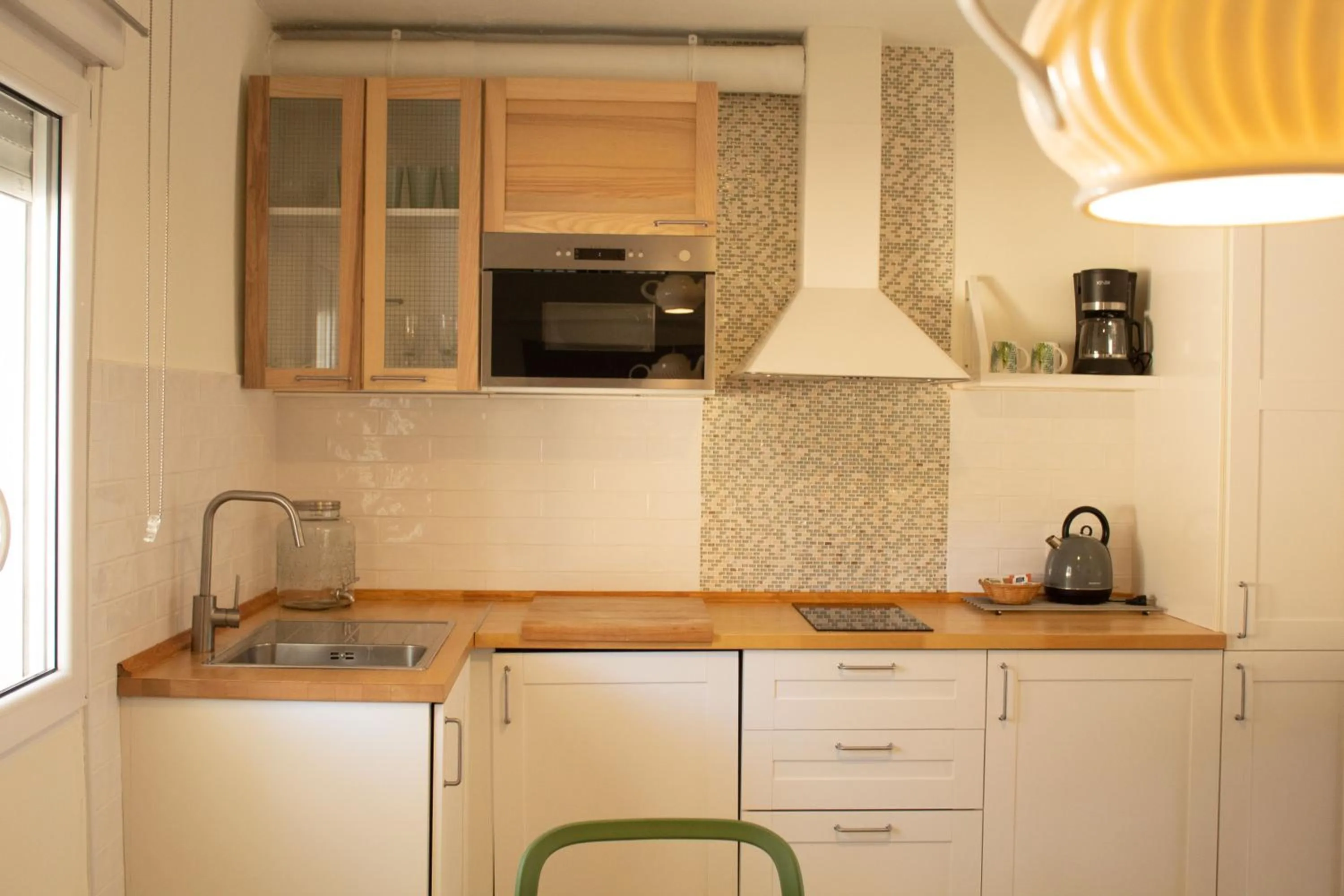 Kitchen or kitchenette in MR Hotelet de la Raconà & Apartments