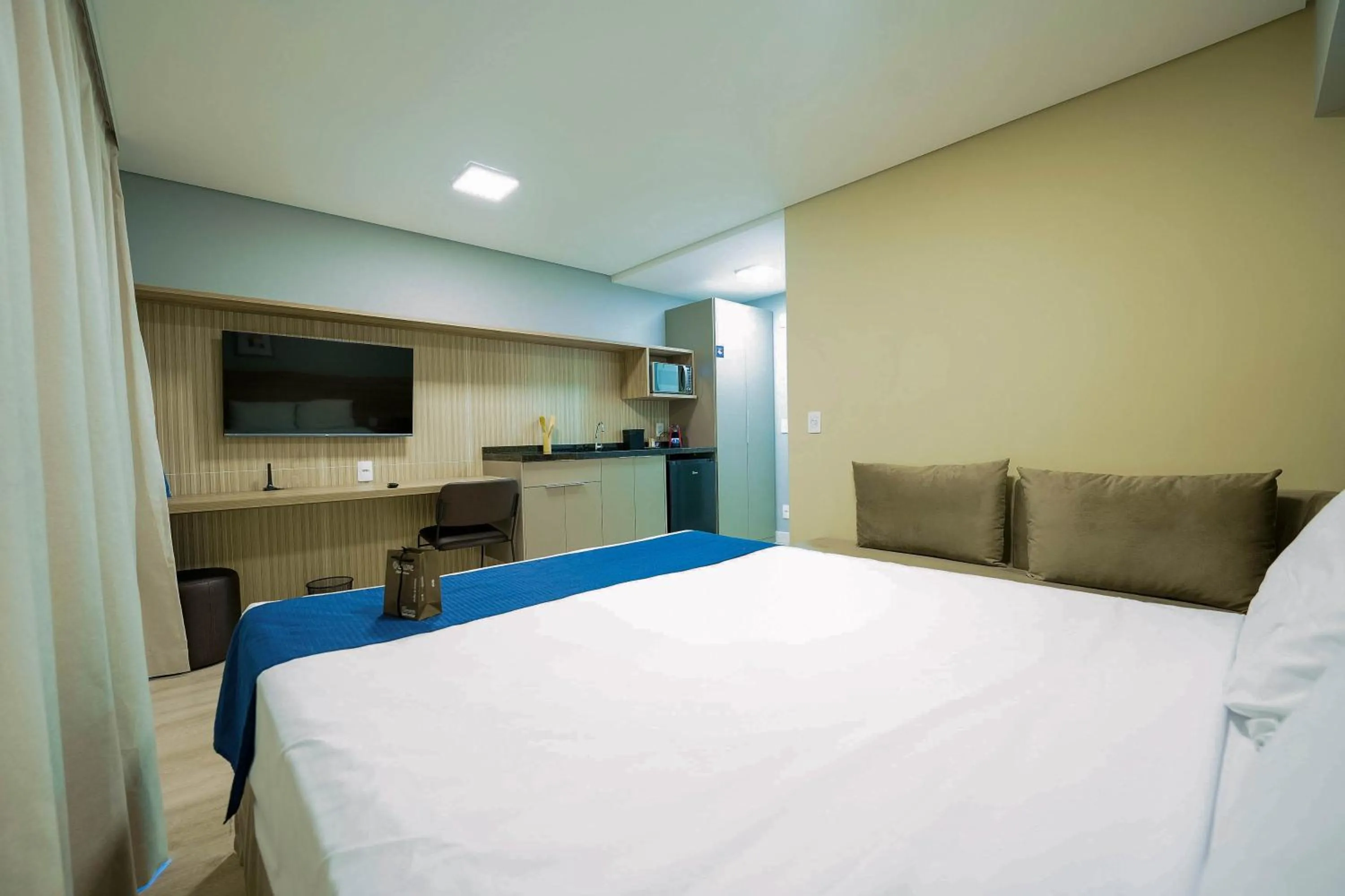 Bed in Apartamentos Studio Allure Moema - Com café da manhã e Valet opcional, Recepção 24 horas