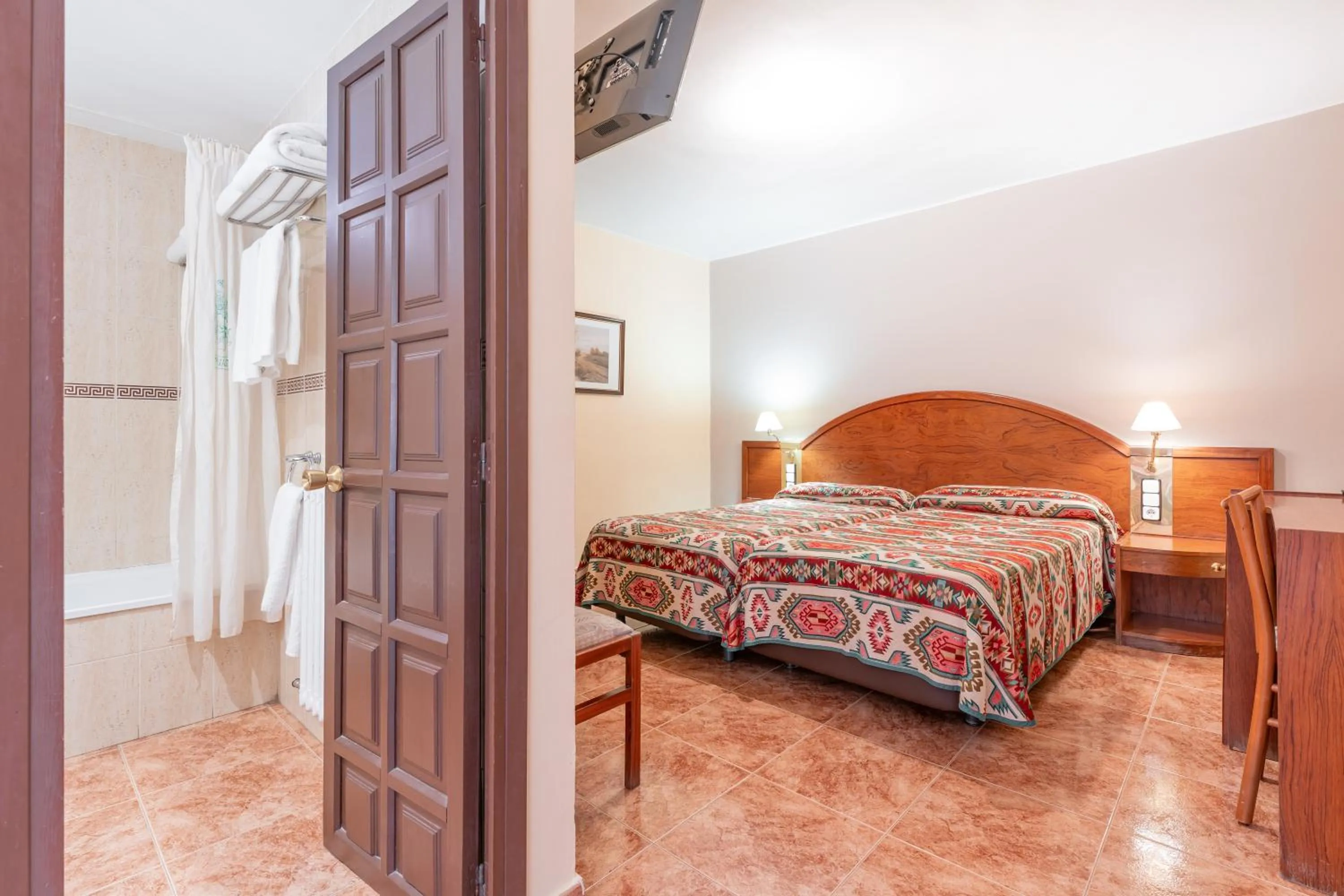 Toilet, Bed in Hotel Mora