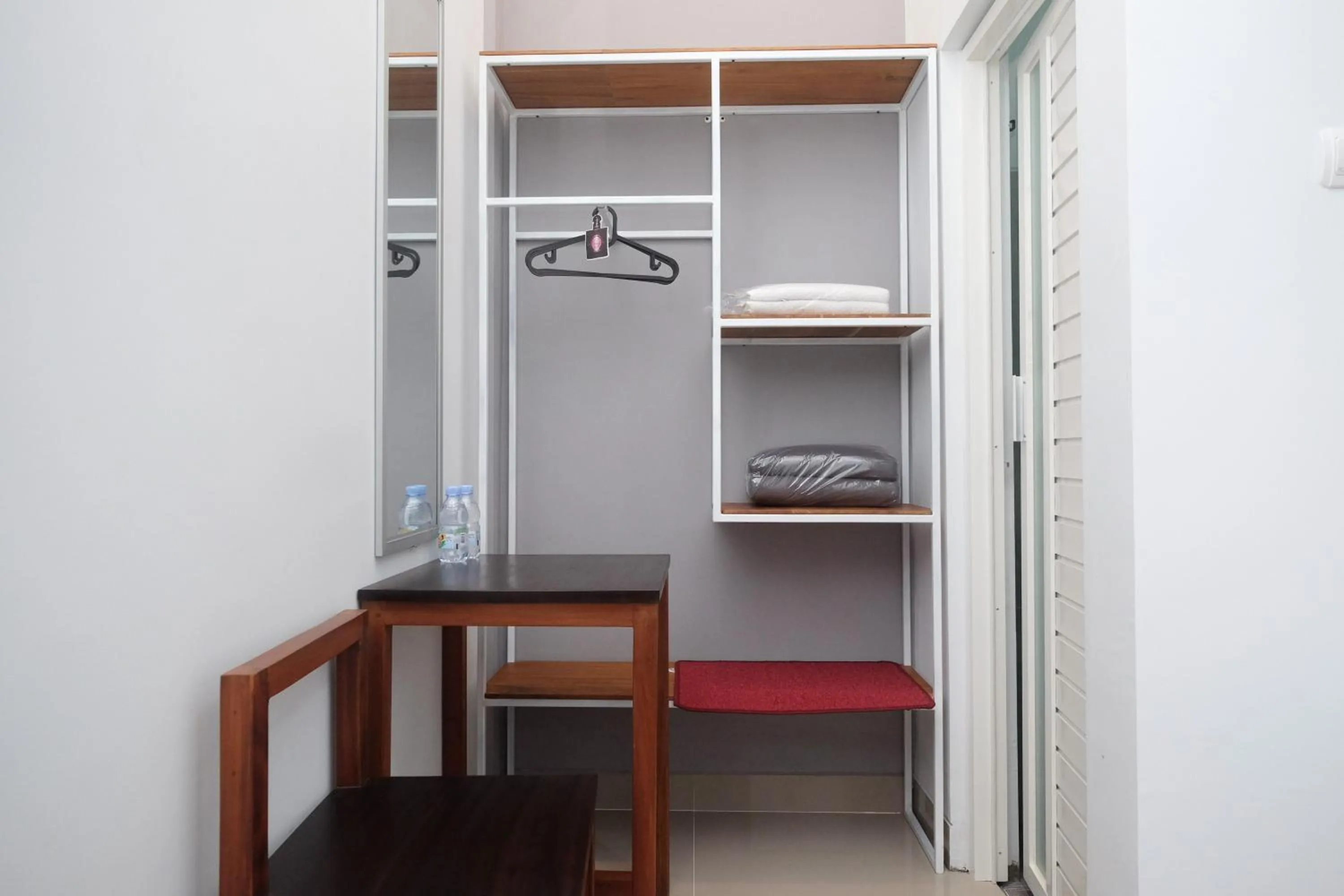 wardrobe, Bed in RedDoorz Plus near Alun Alun Kota Blora