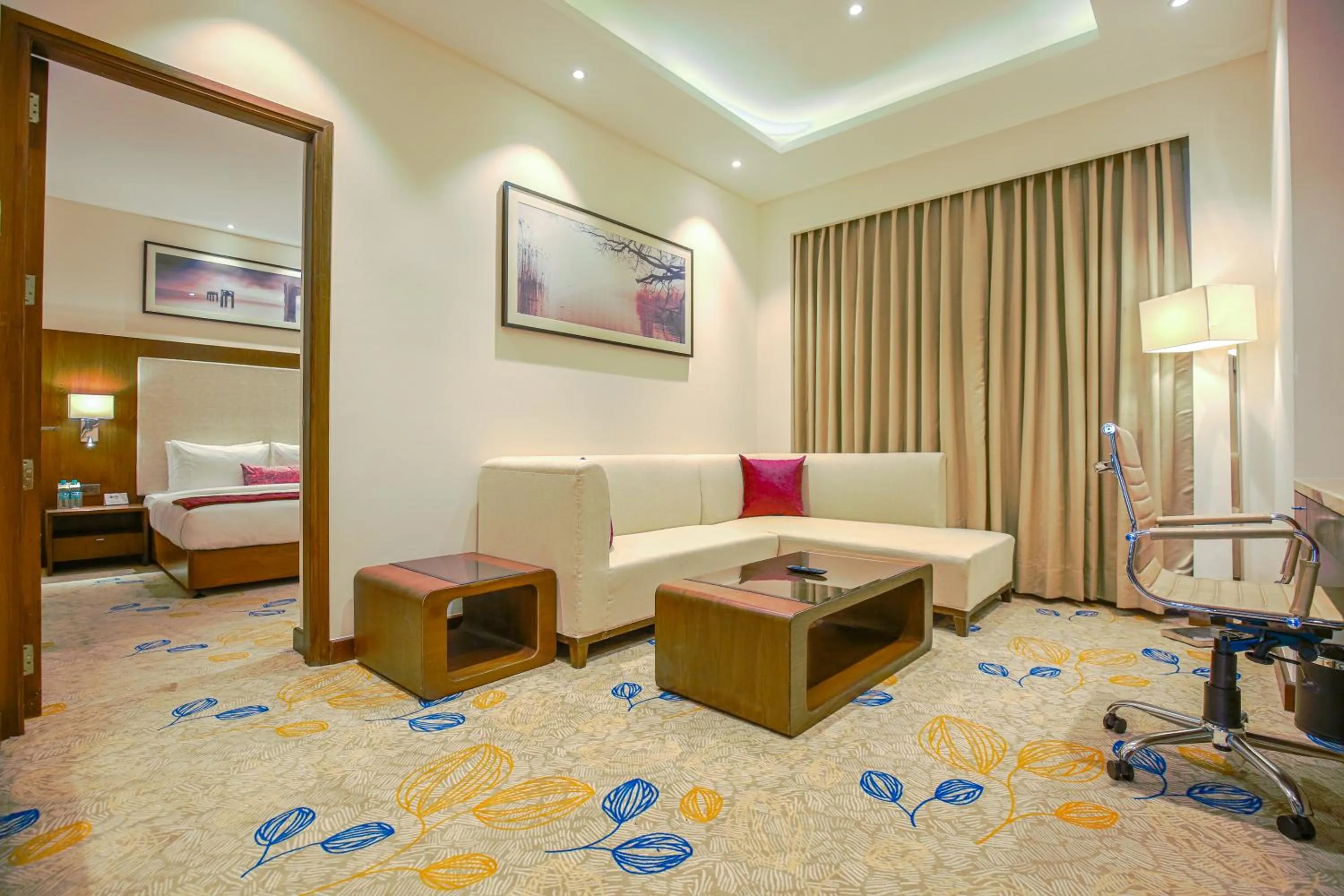 Seating area, Bed in Best Western Plus Chandigarh Mohali
