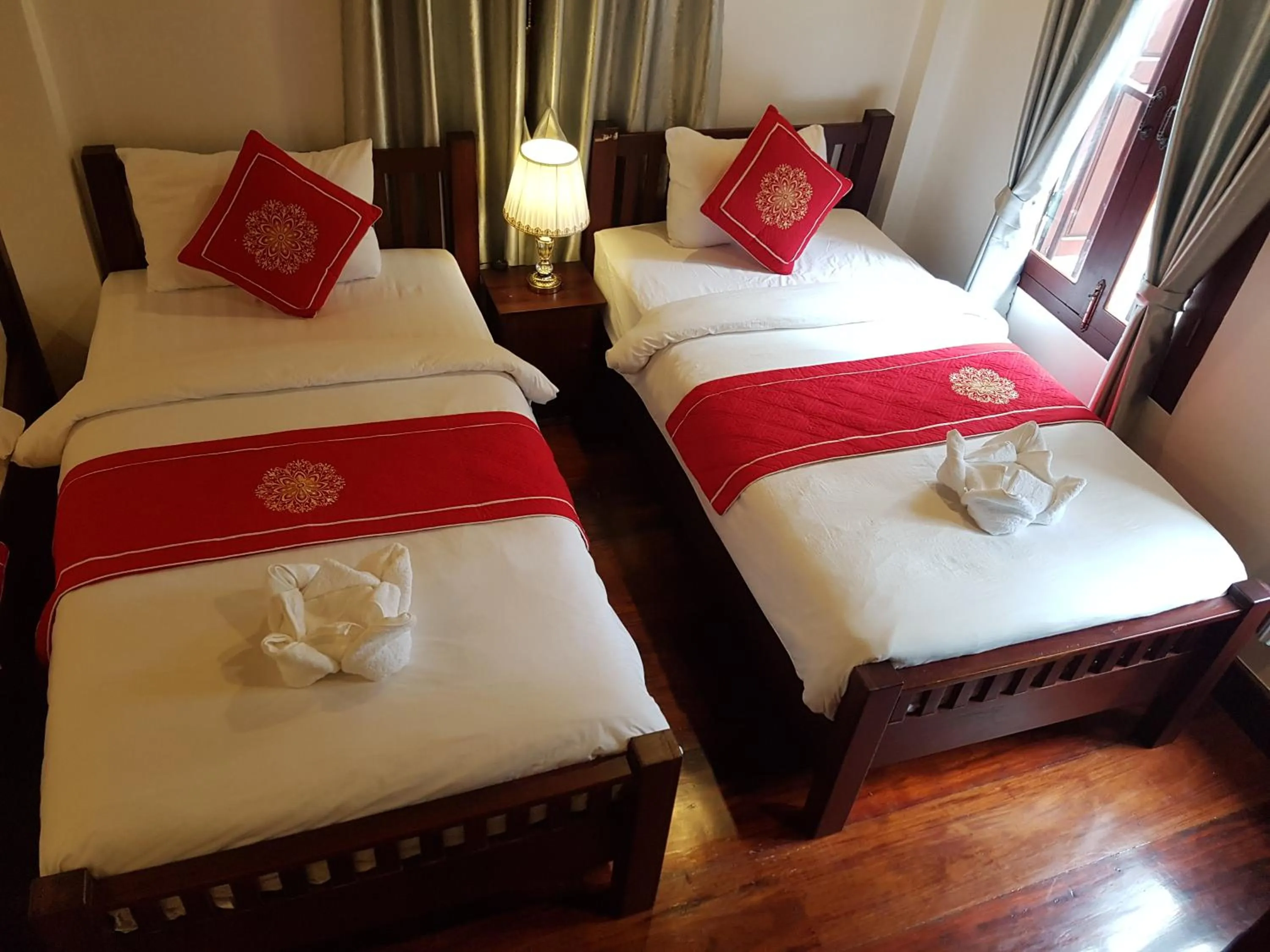 Bed in Luang Prabang Pangkham Lodge