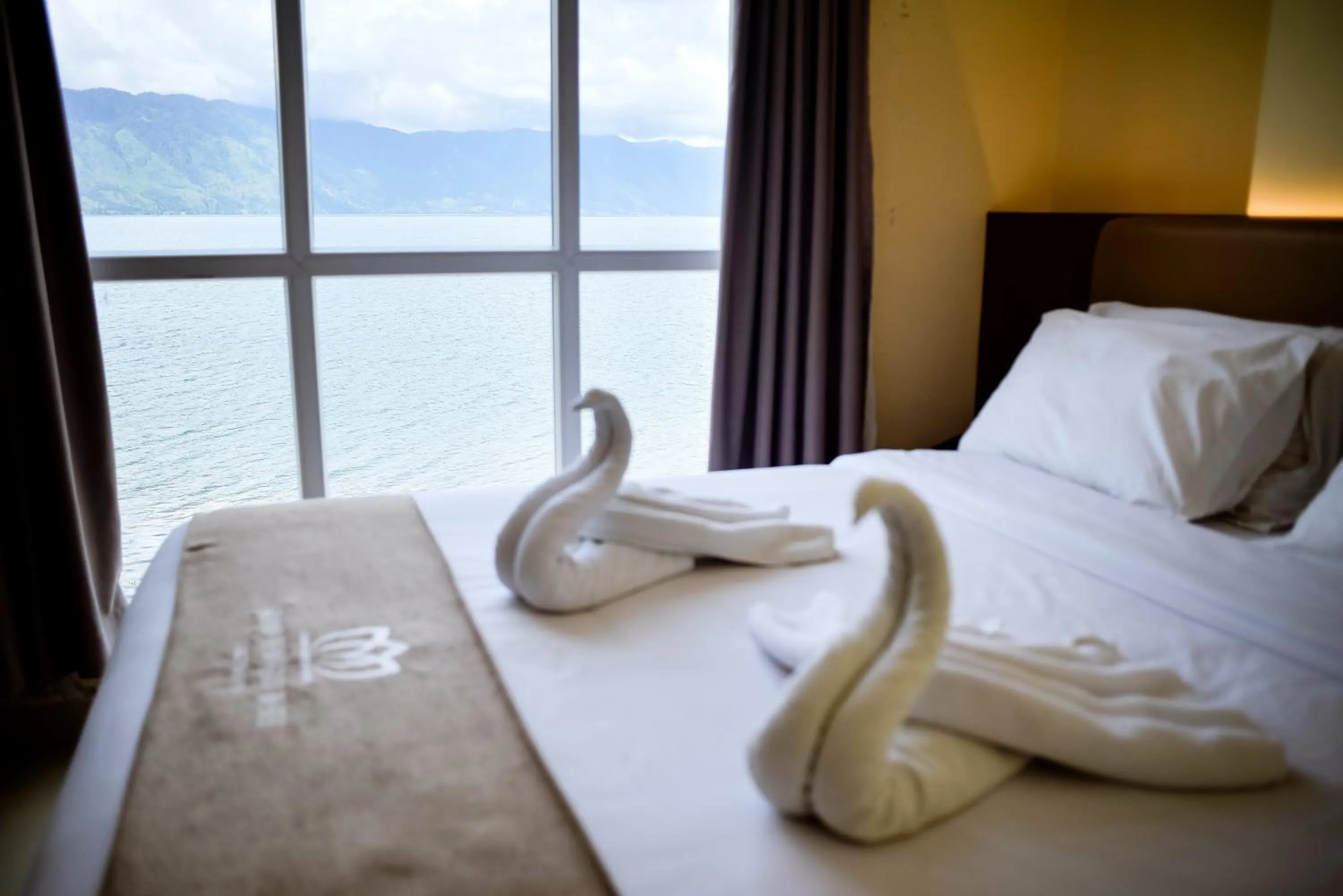 Bed in Portola Grand Renggali Hotel Takengon