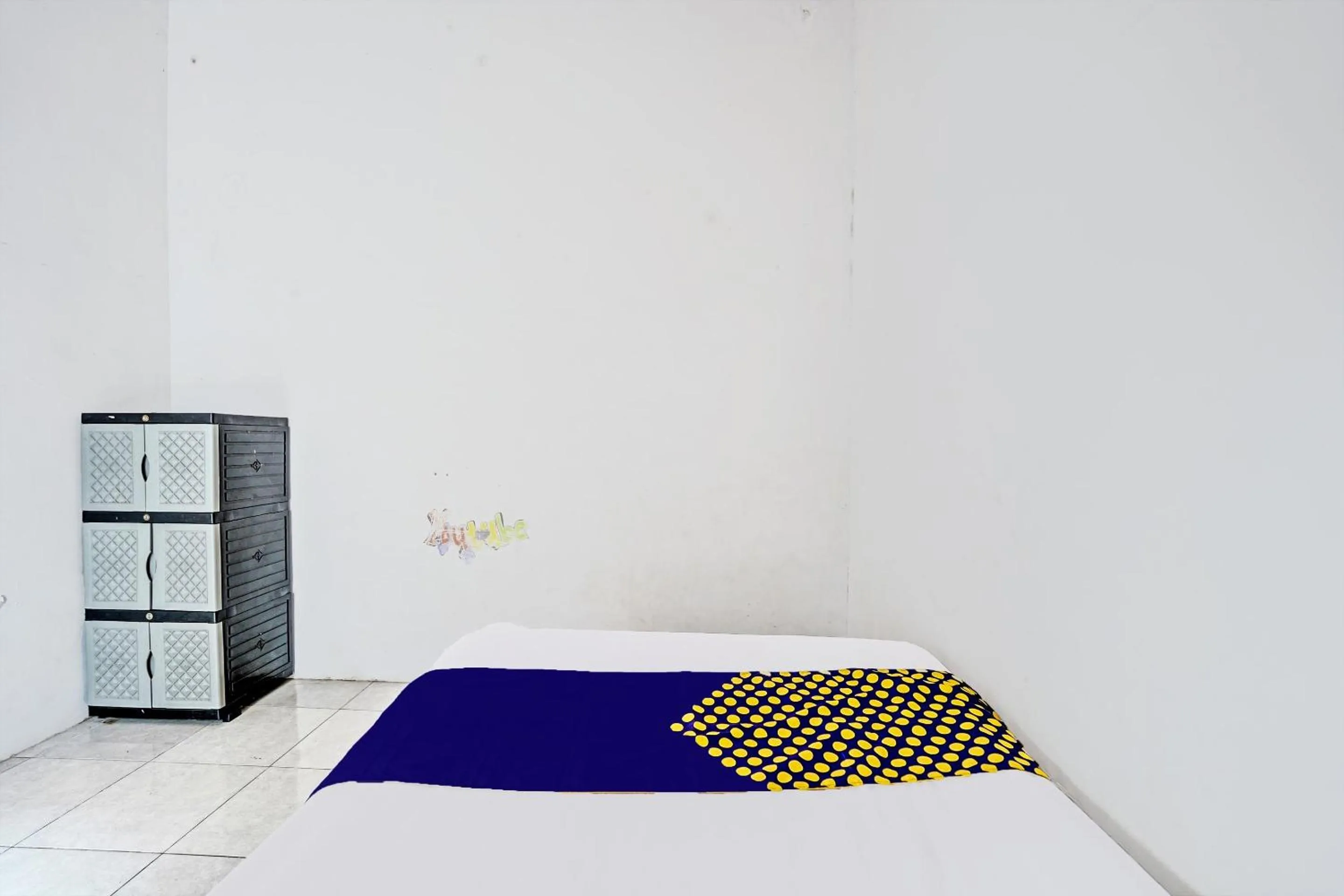 Bedroom in Hotel O Fun Guesthouse Syariah