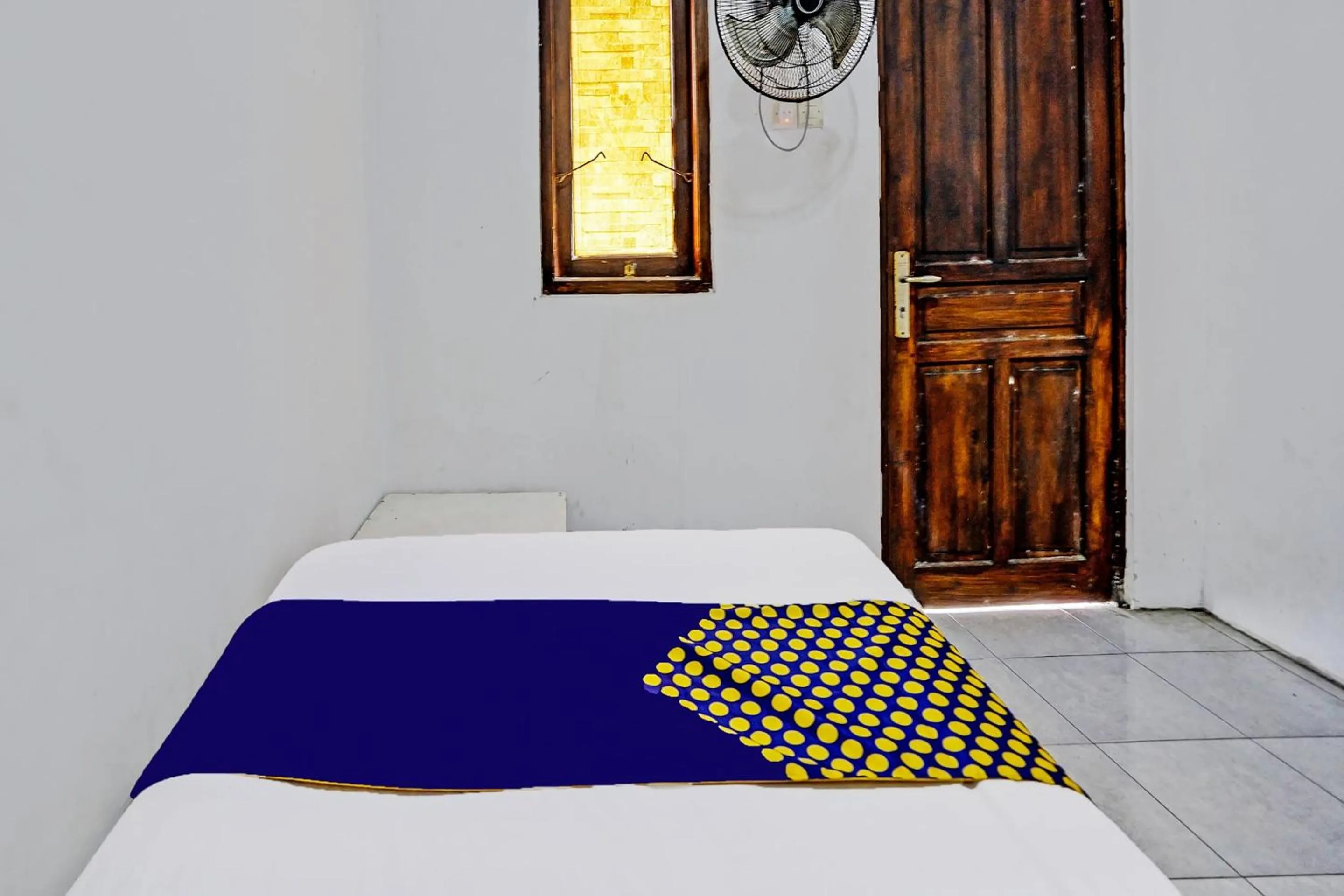 Bedroom in Hotel O Fun Guesthouse Syariah