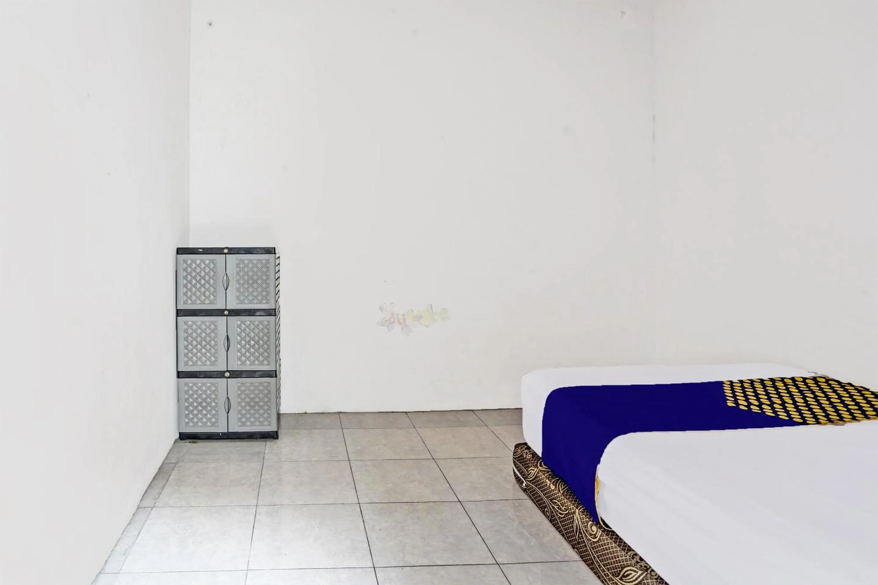 Bedroom in Hotel O Fun Guesthouse Syariah