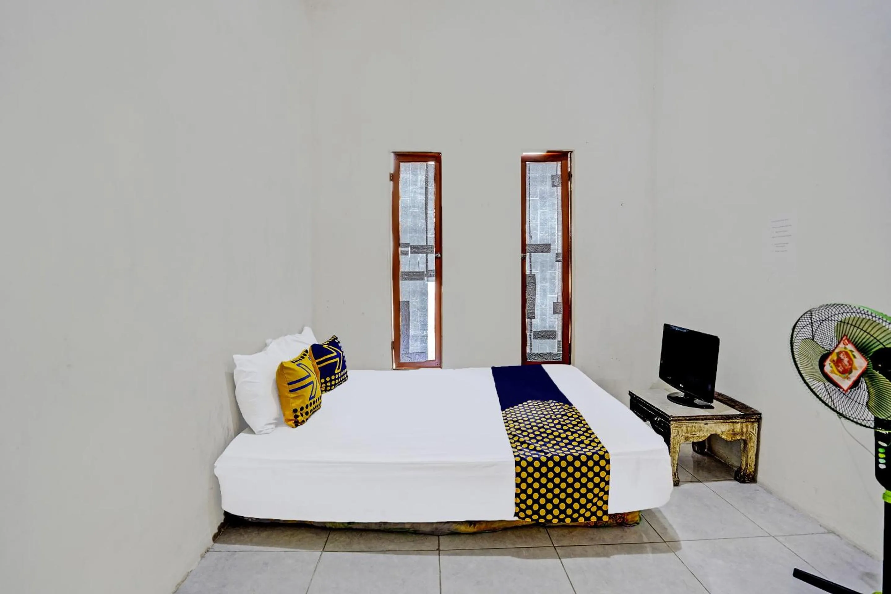 Bedroom, Bed in OYO LIFE 92077 Tarlo Guest House 3