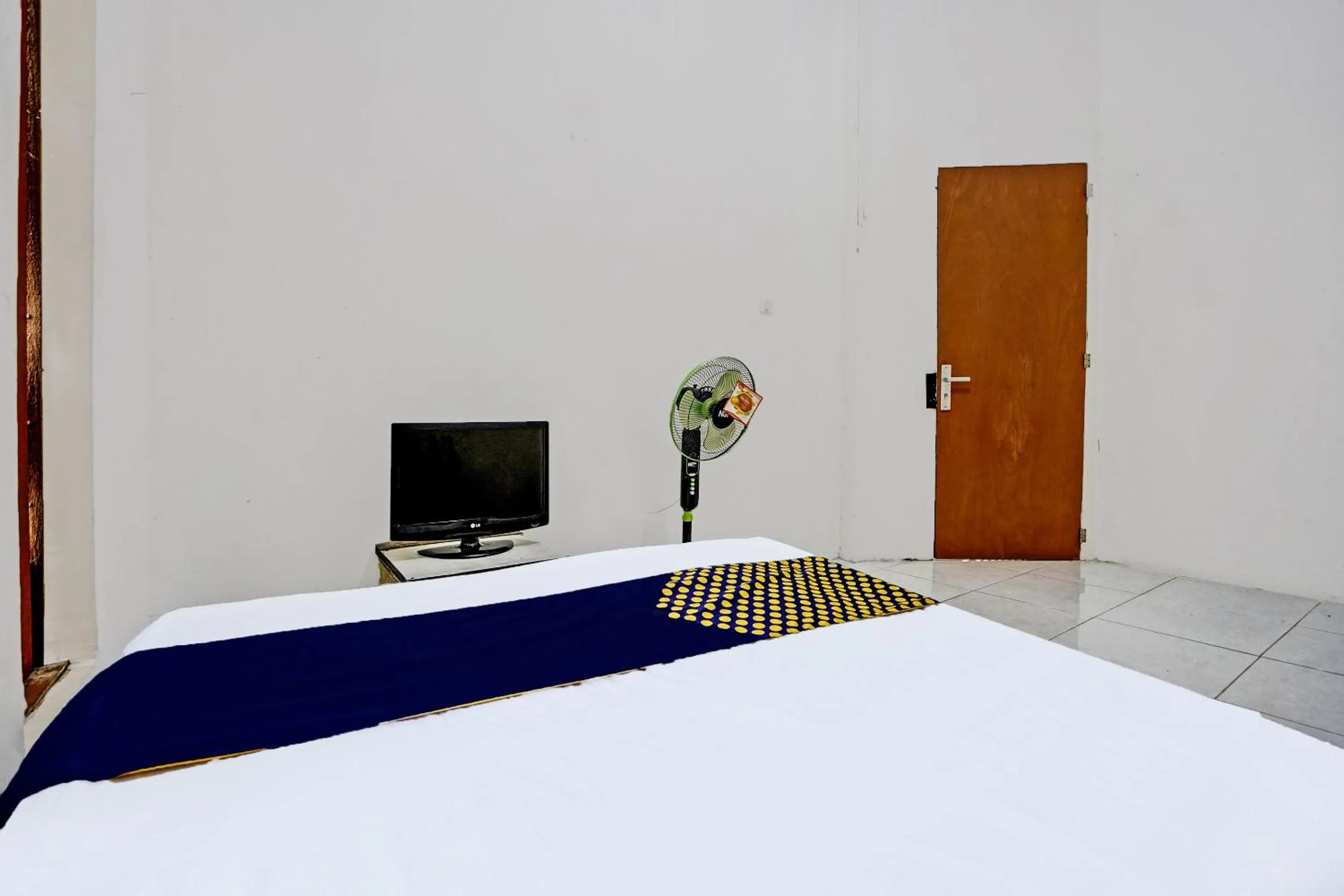 Bedroom, Bed in OYO LIFE 92077 Tarlo Guest House 3