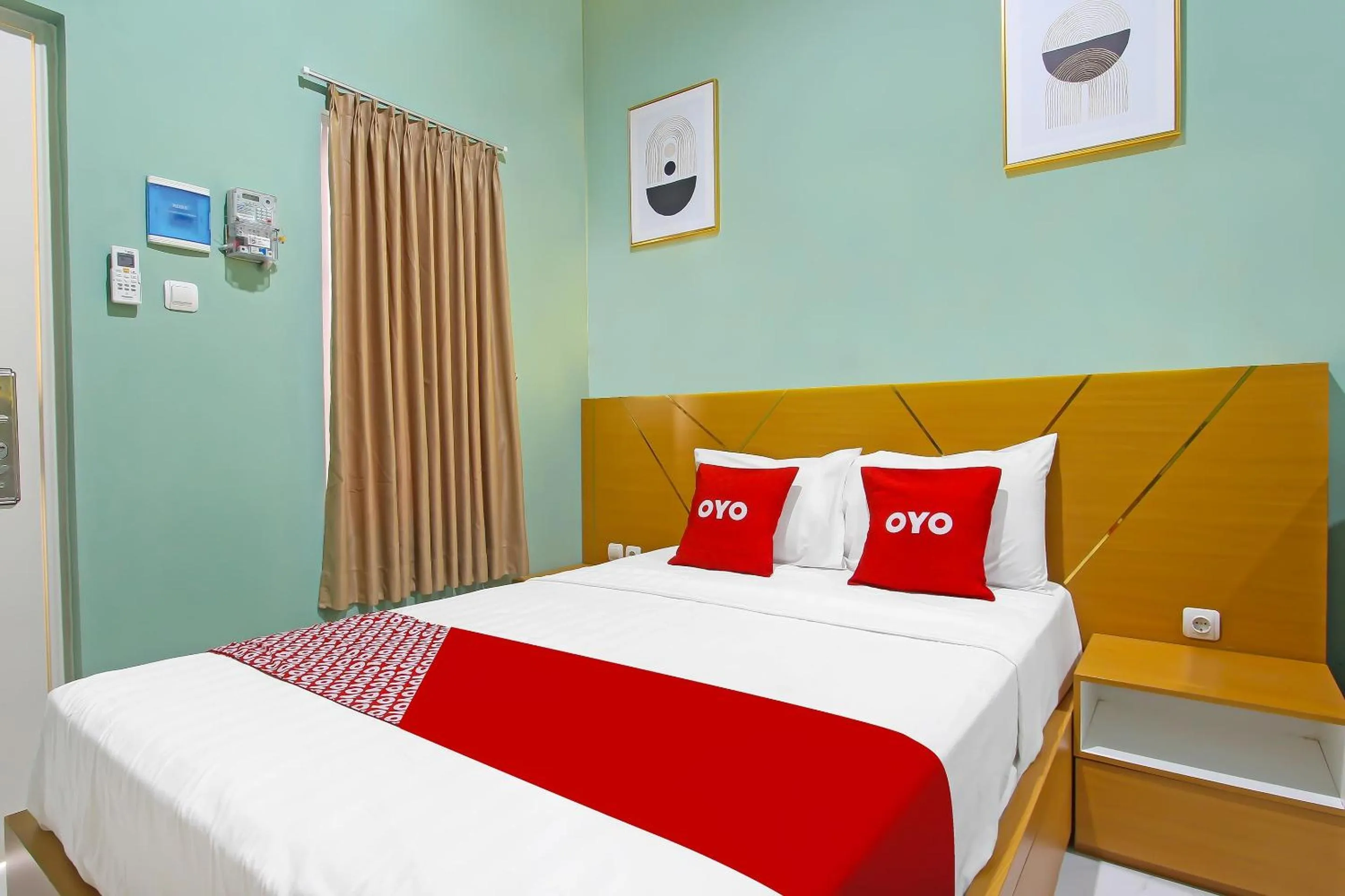 Bedroom in Capital O 92105 A'shanti Inn