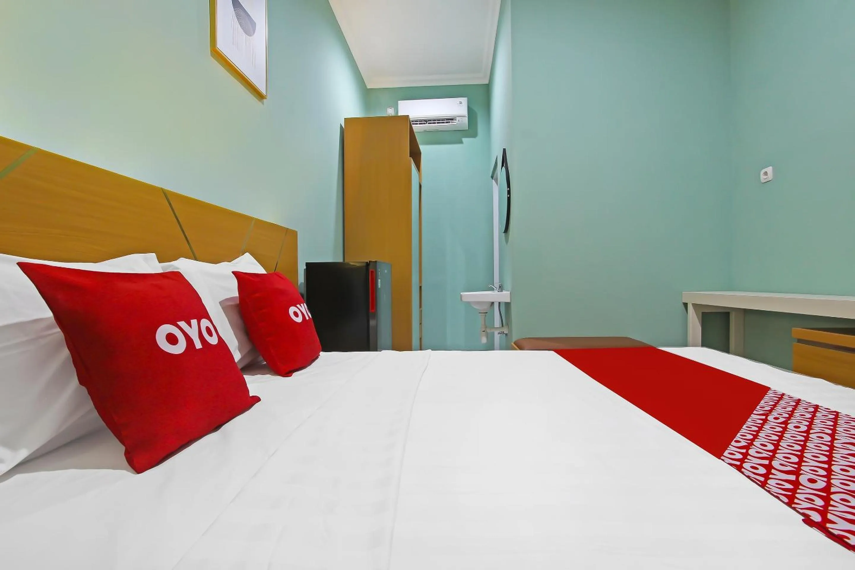 Bedroom in Capital O 92105 A'shanti Inn