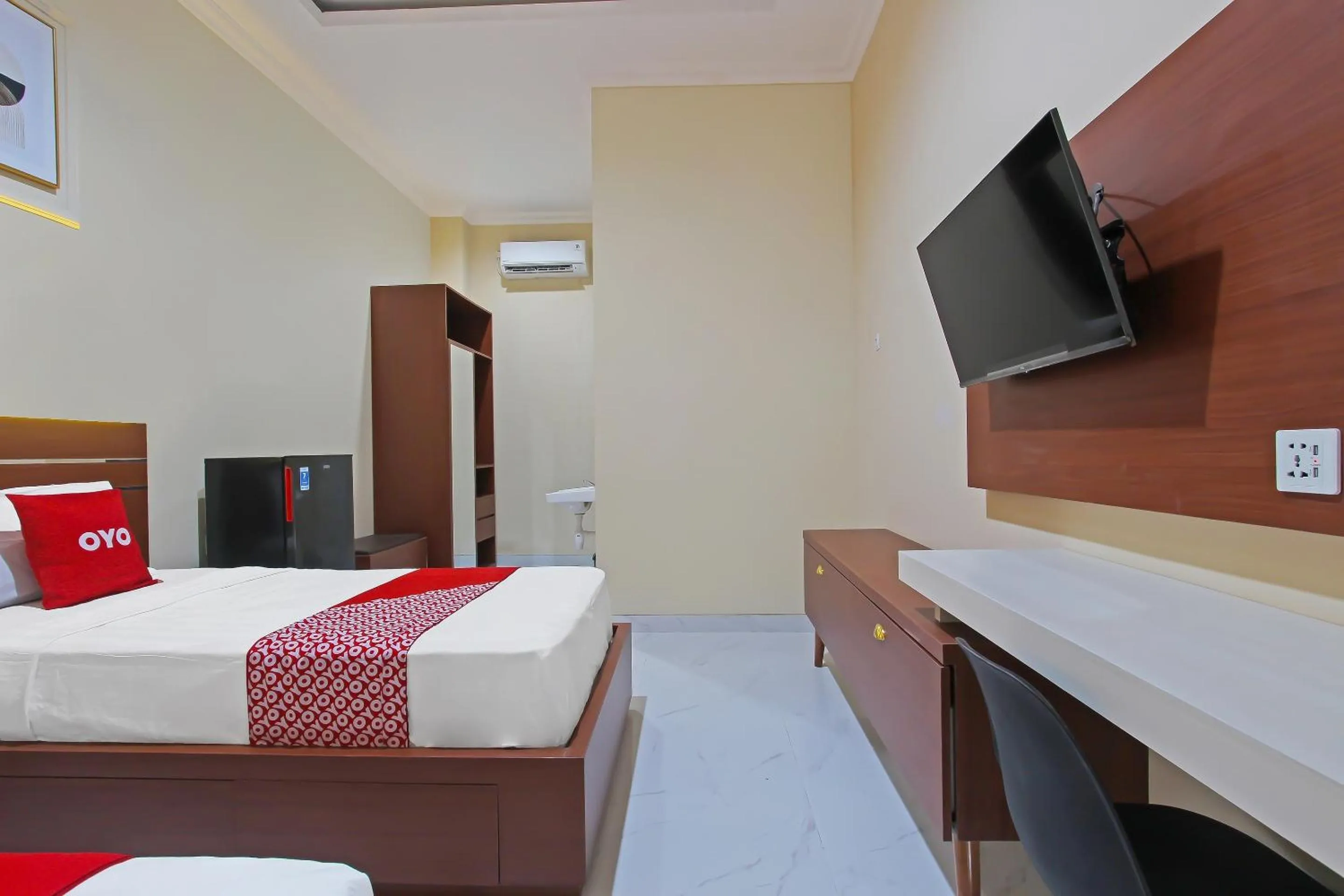 Bedroom in Capital O 92105 A'shanti Inn