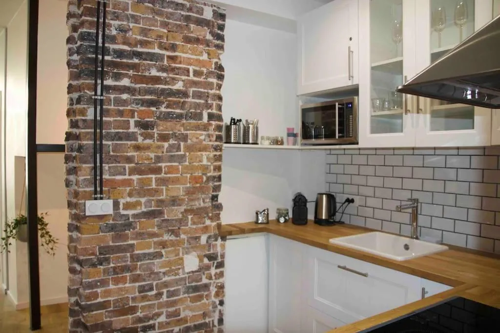 Another brick in the wall Apartment in Paris Sleeps 9