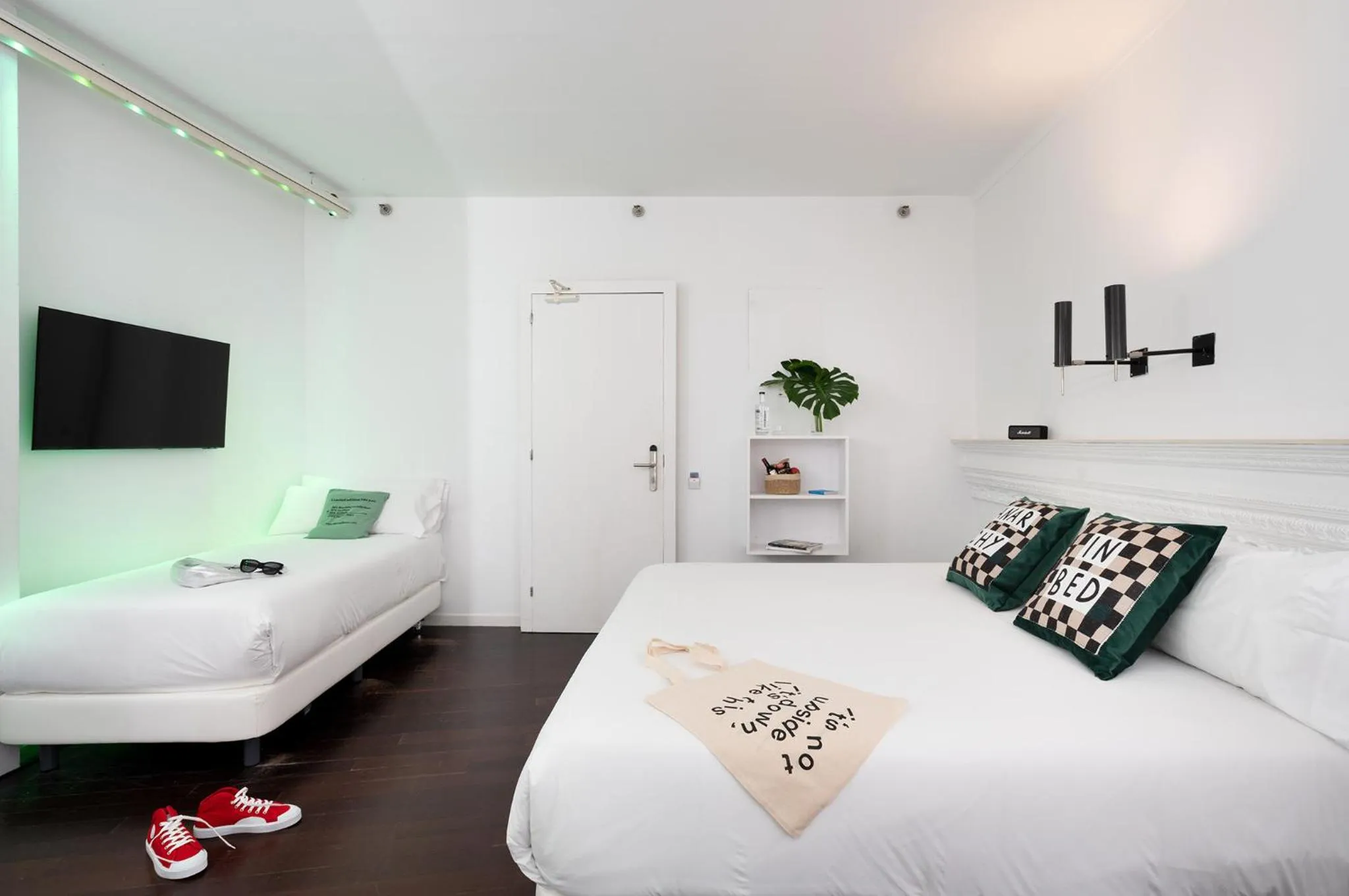 Bed in Chic & Basic Born Boutique Hotel
