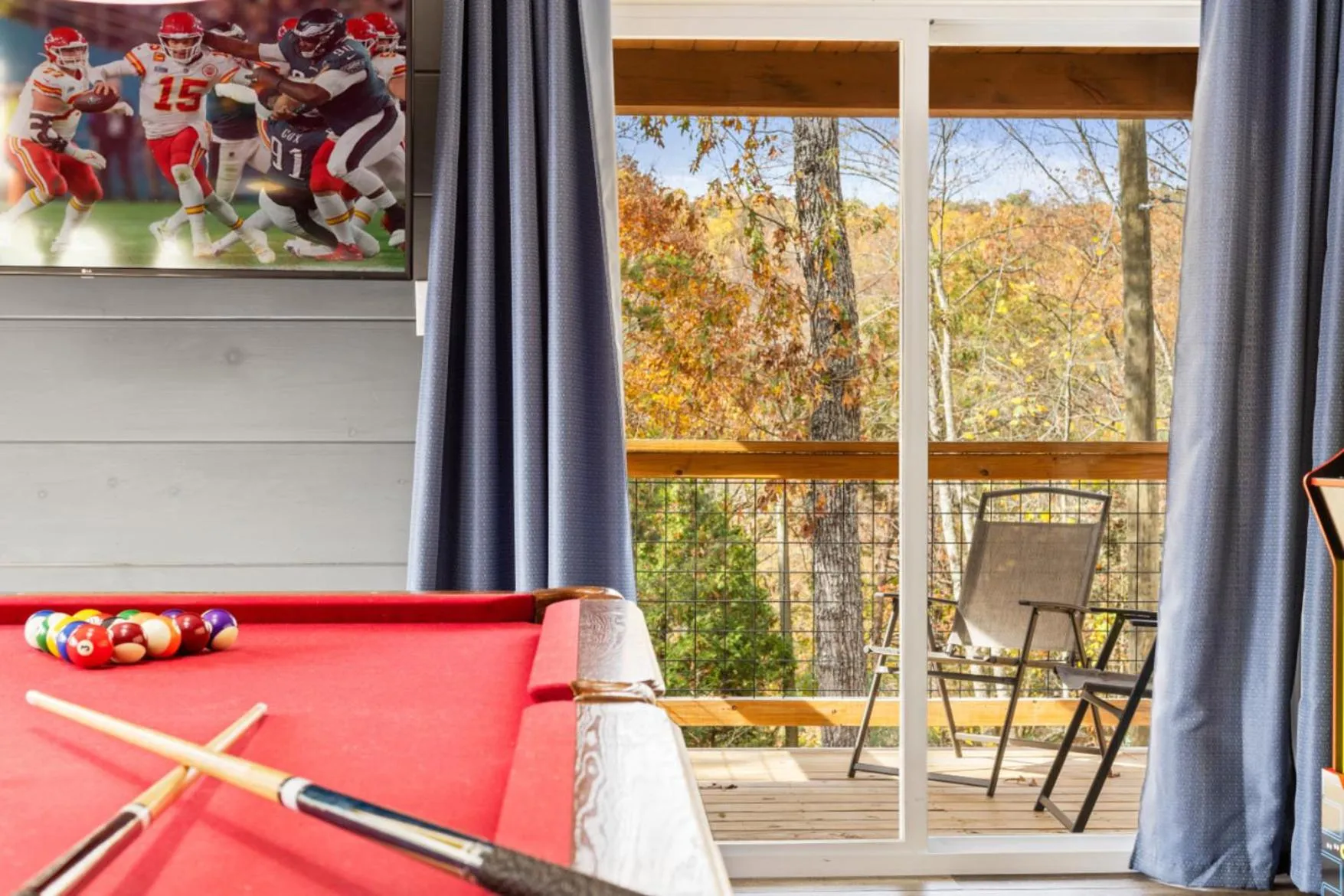 Game Room in Romantic Cabin Retreat By Ghosal Luxury Lodging