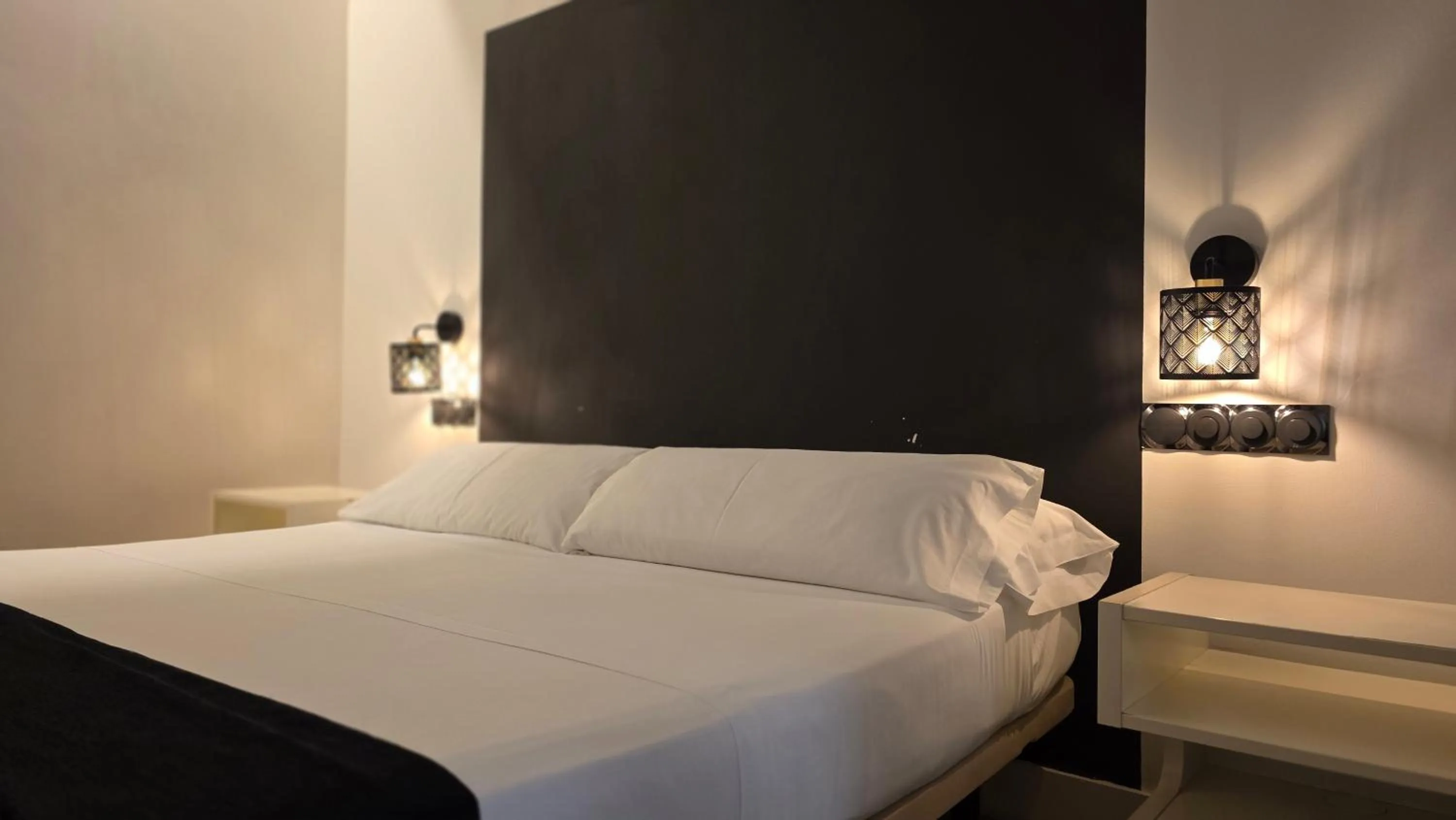 Bed in Hostal Santa Ana Colors